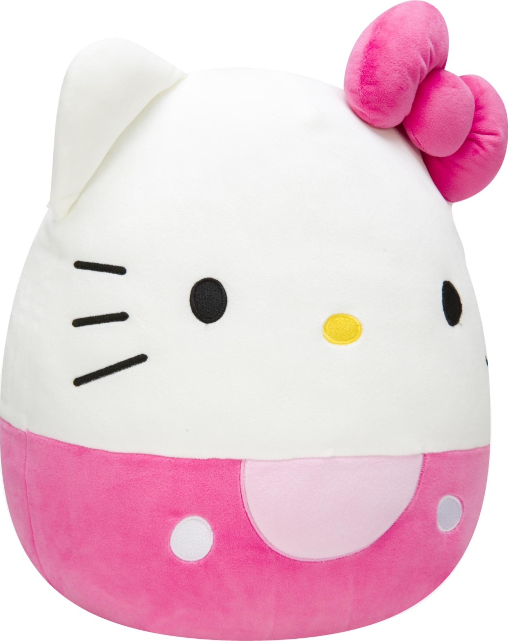 Peluche Hello Kitty blanche avec nœud rose et bas du corps rose.