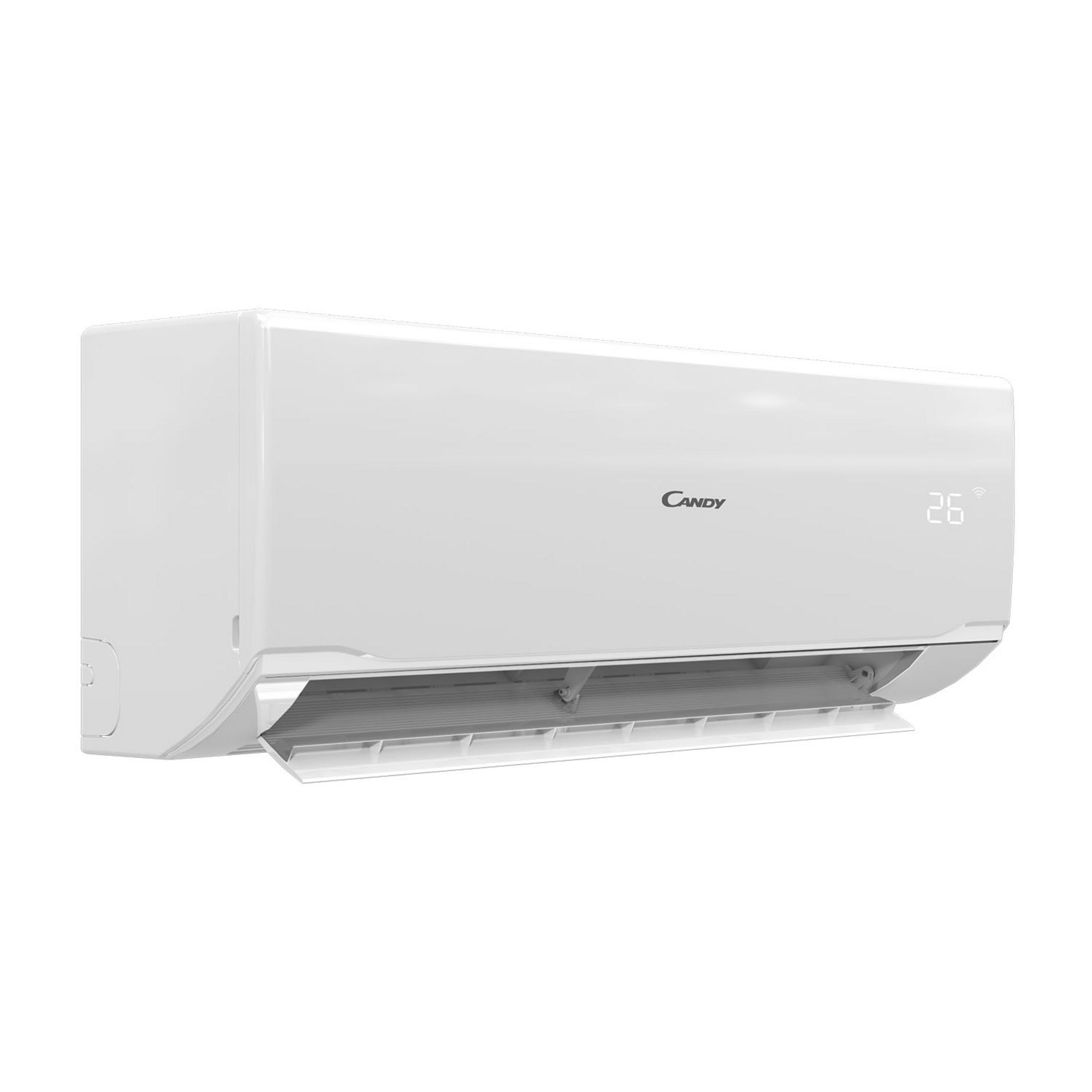 Un condizionatore Candy bianco con display digitale 26°C.
