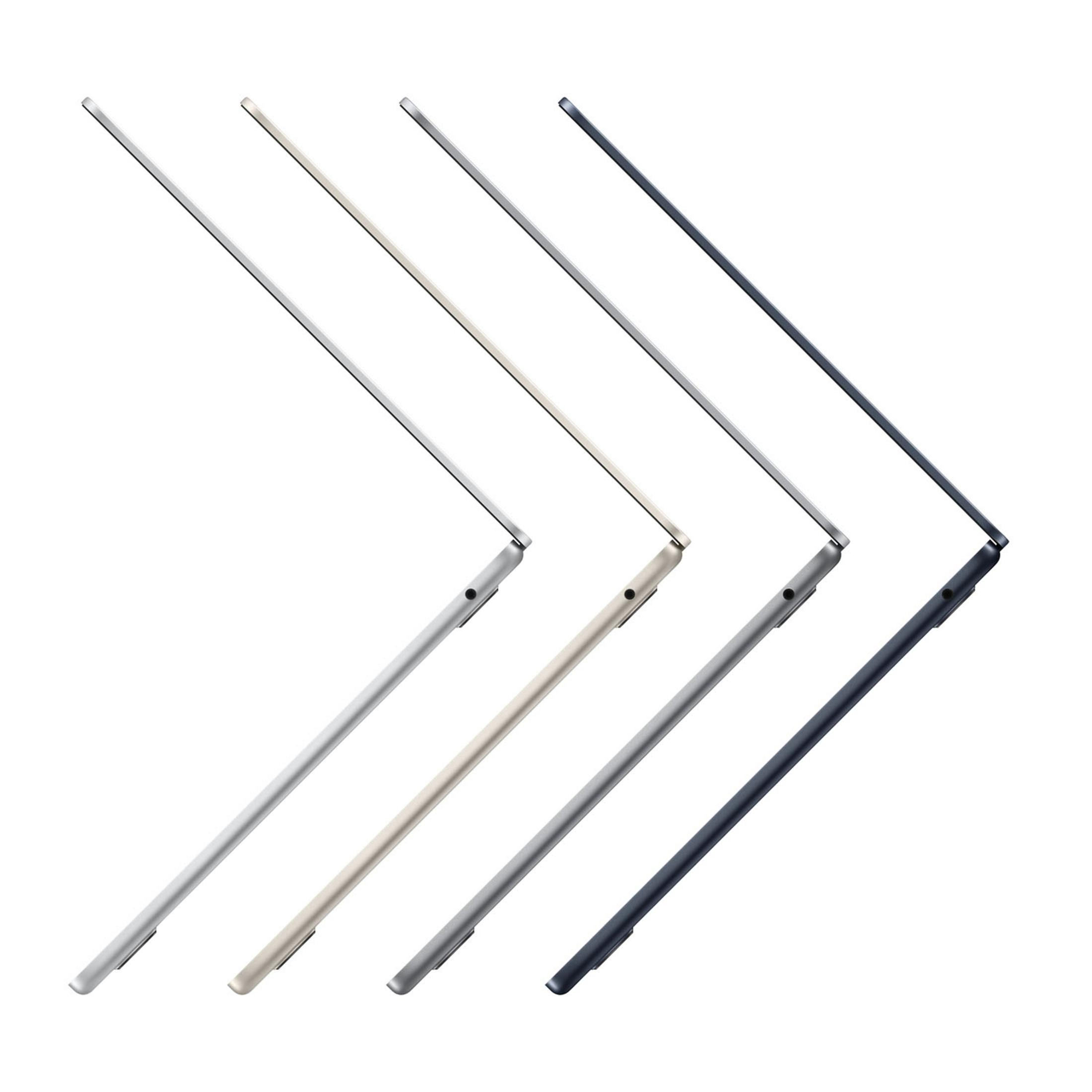 Quattro laptop grigi, dorati, argentati e blu, allineati su sfondo bianco.