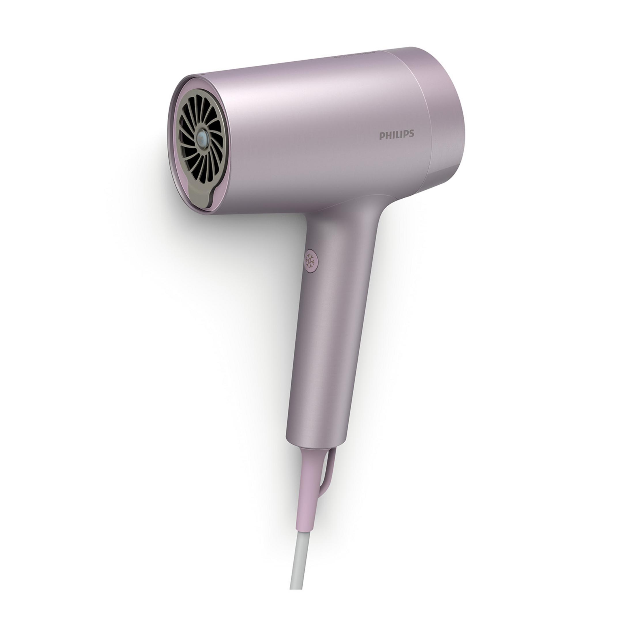Różowa suszarka do włosów Philips z białym kablem.