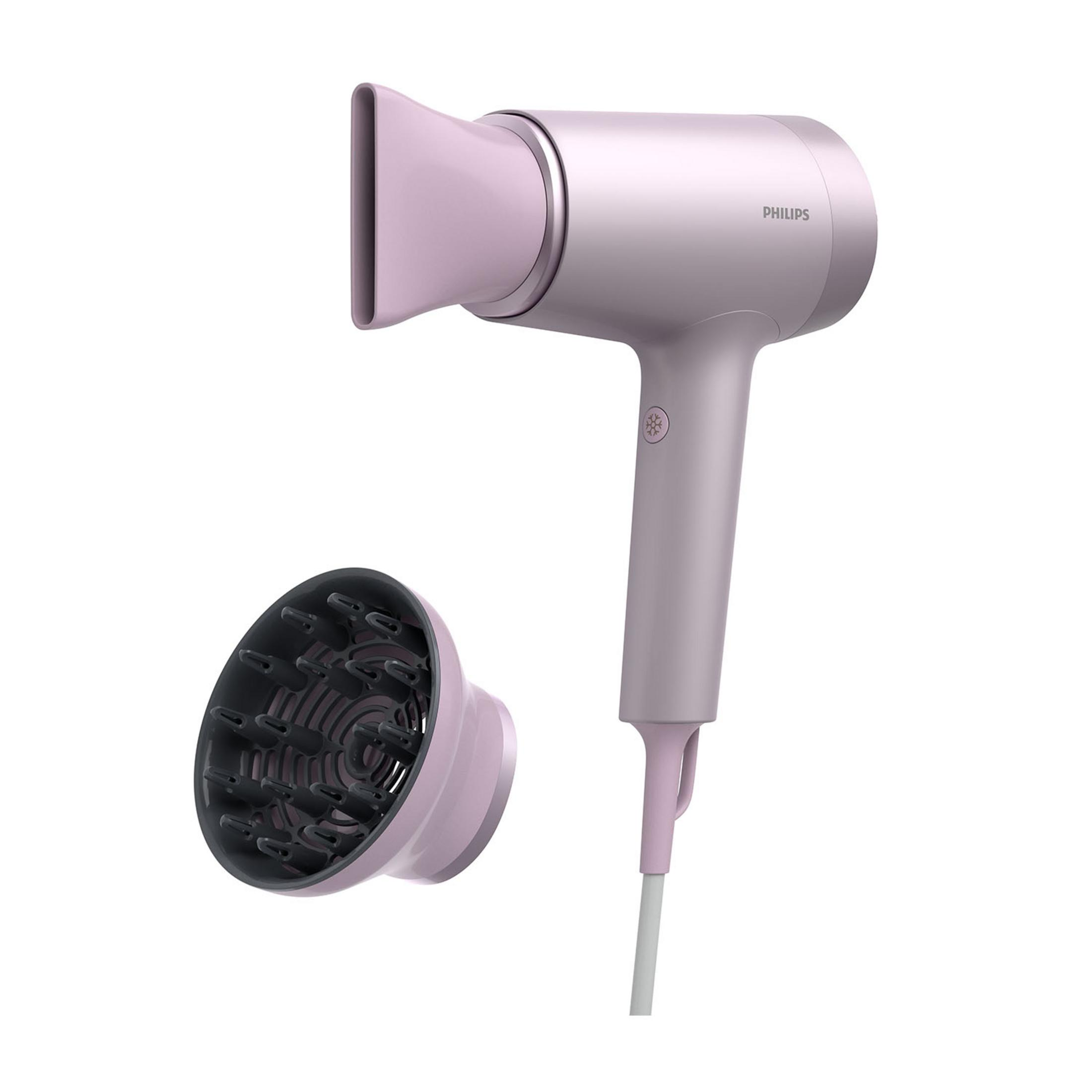 Różowa suszarka do włosów Philips z dyfuzorem.