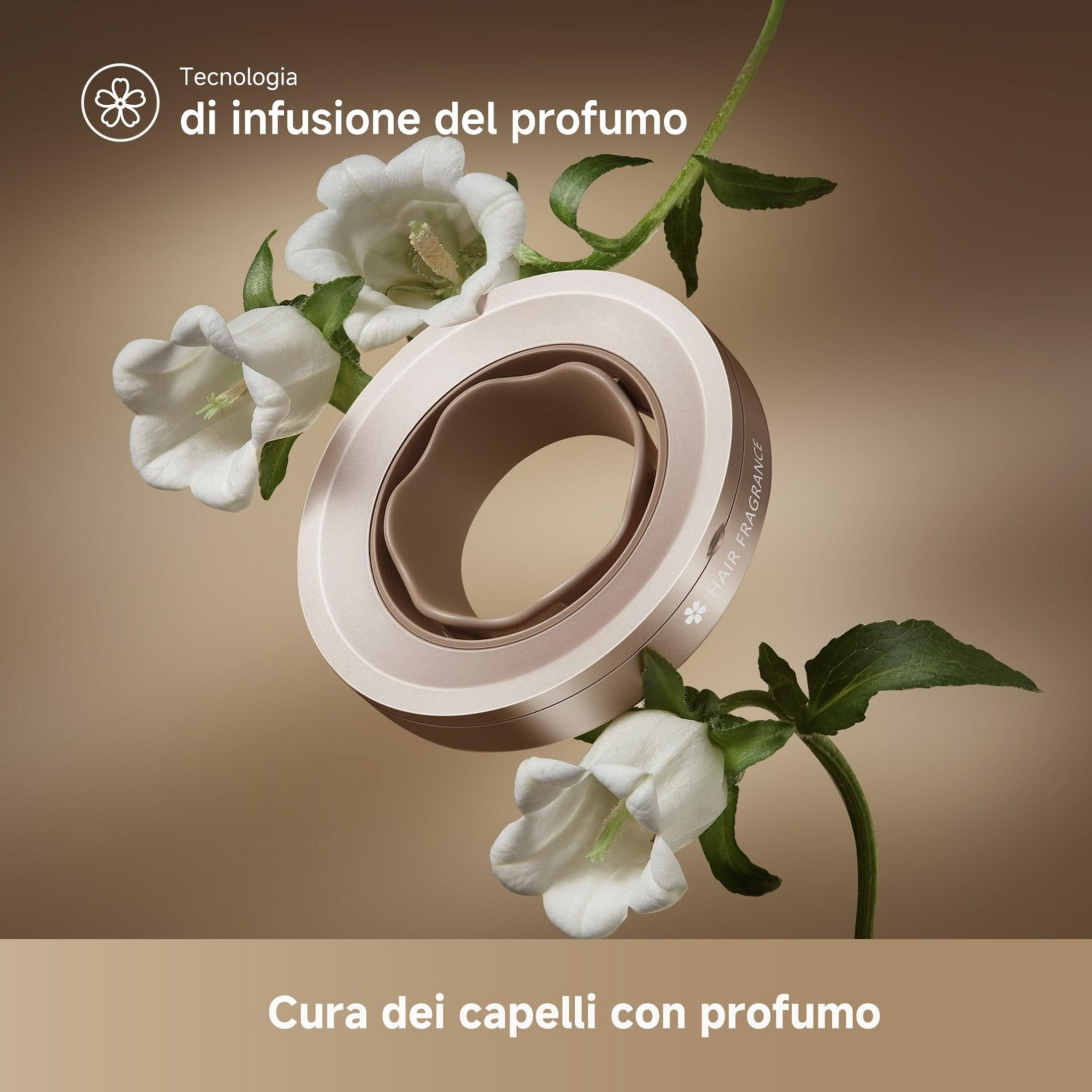 Różowo-złote urządzenie do pielęgnacji włosów z białymi kwiatami.