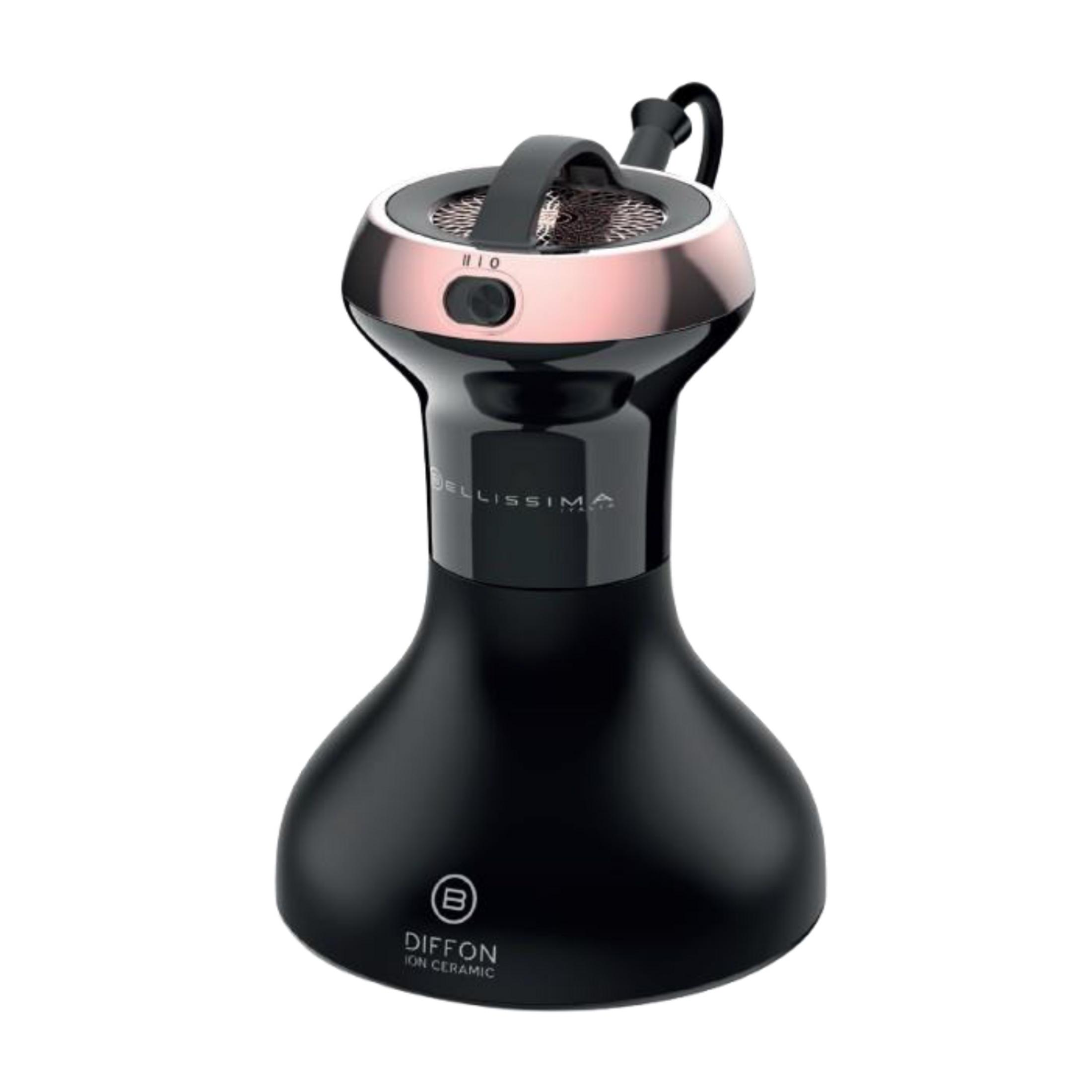 Czarny dyfuzor z miedzianym akcentem i uchwytem.