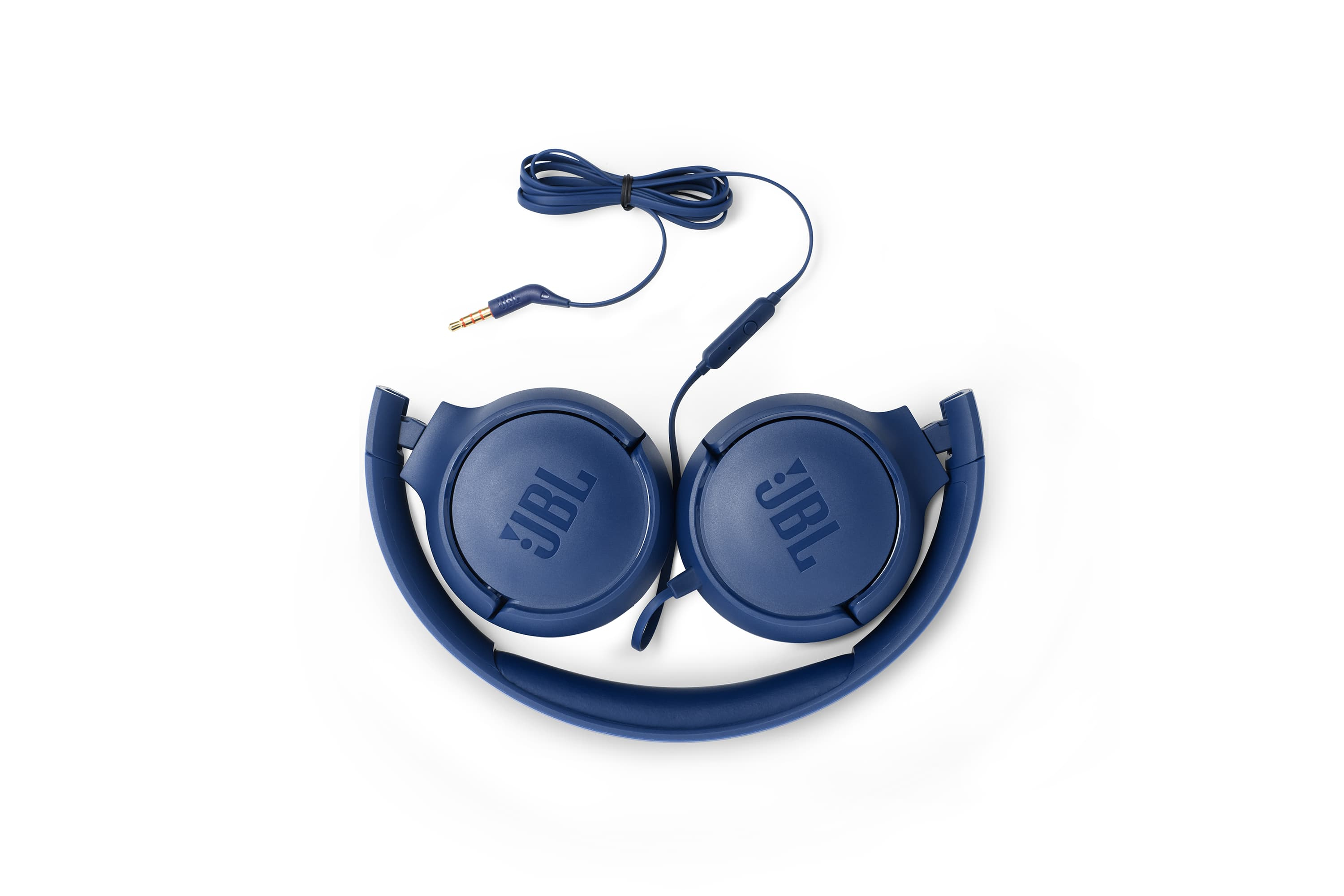 Dark blue JBL headphones lie on a white background, with cable and plug.