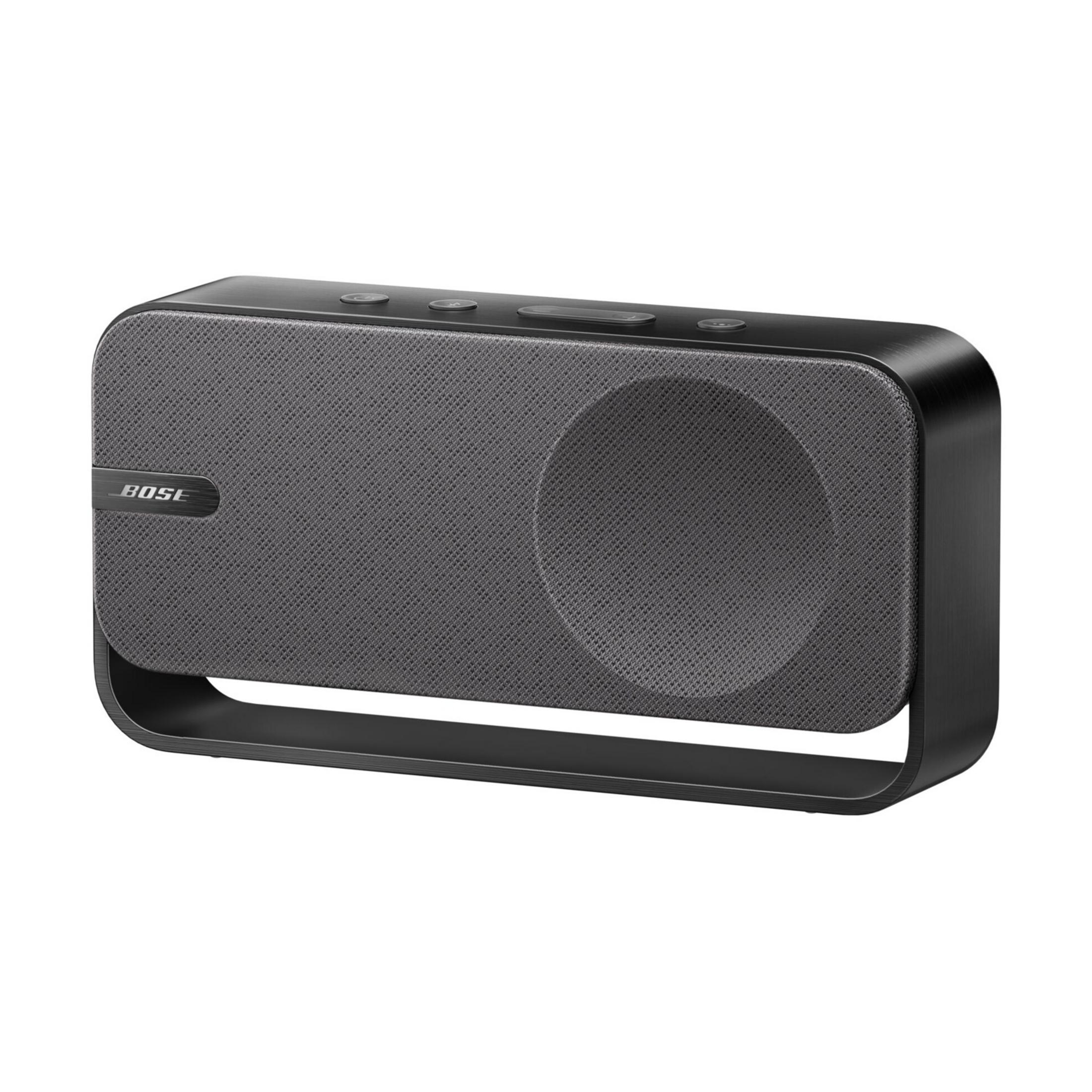 Altavoz Bose negro con rejilla de tela gris y logo plateado.