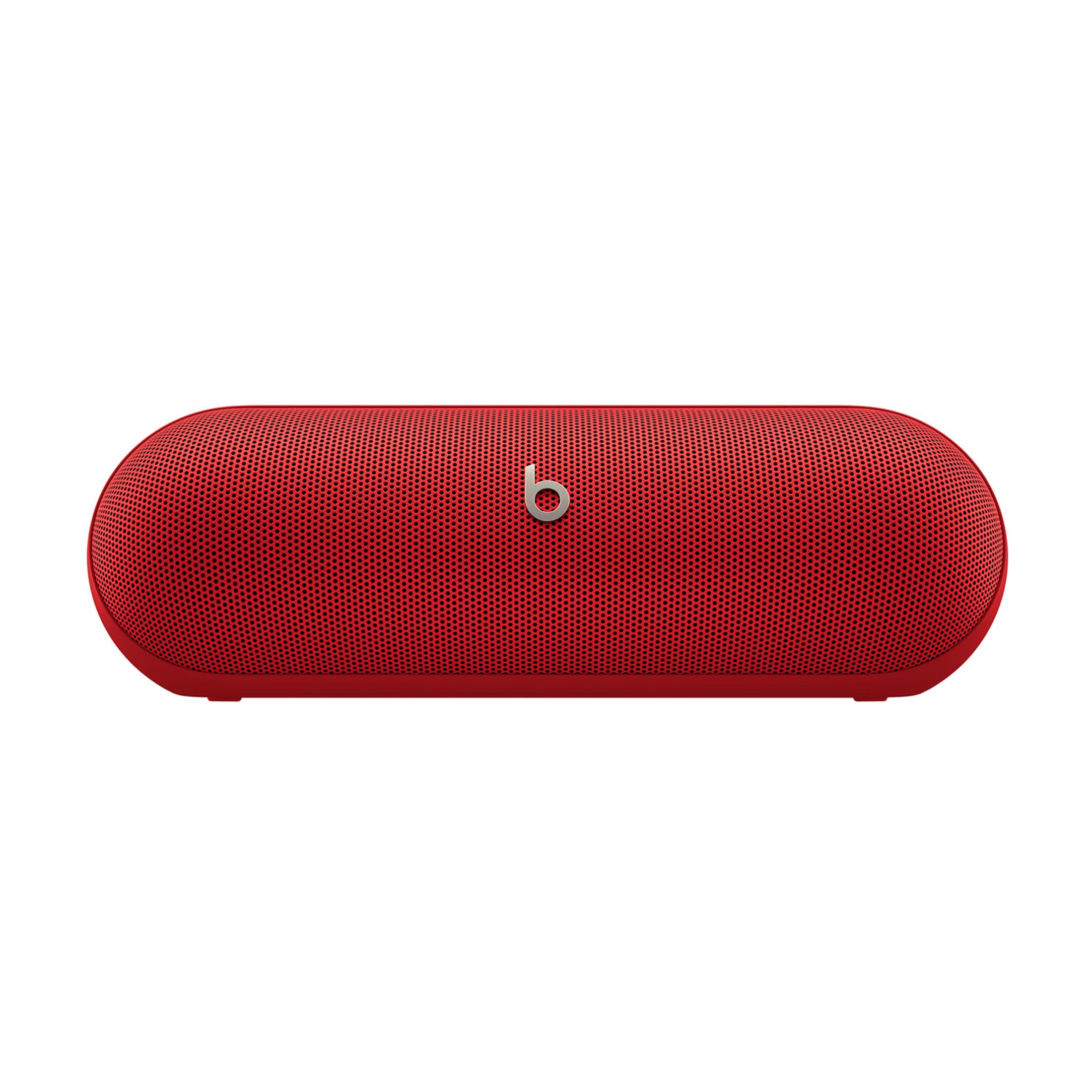 Rode Beats Pill+ luidspreker met zilveren B-logo, op witte achtergrond.