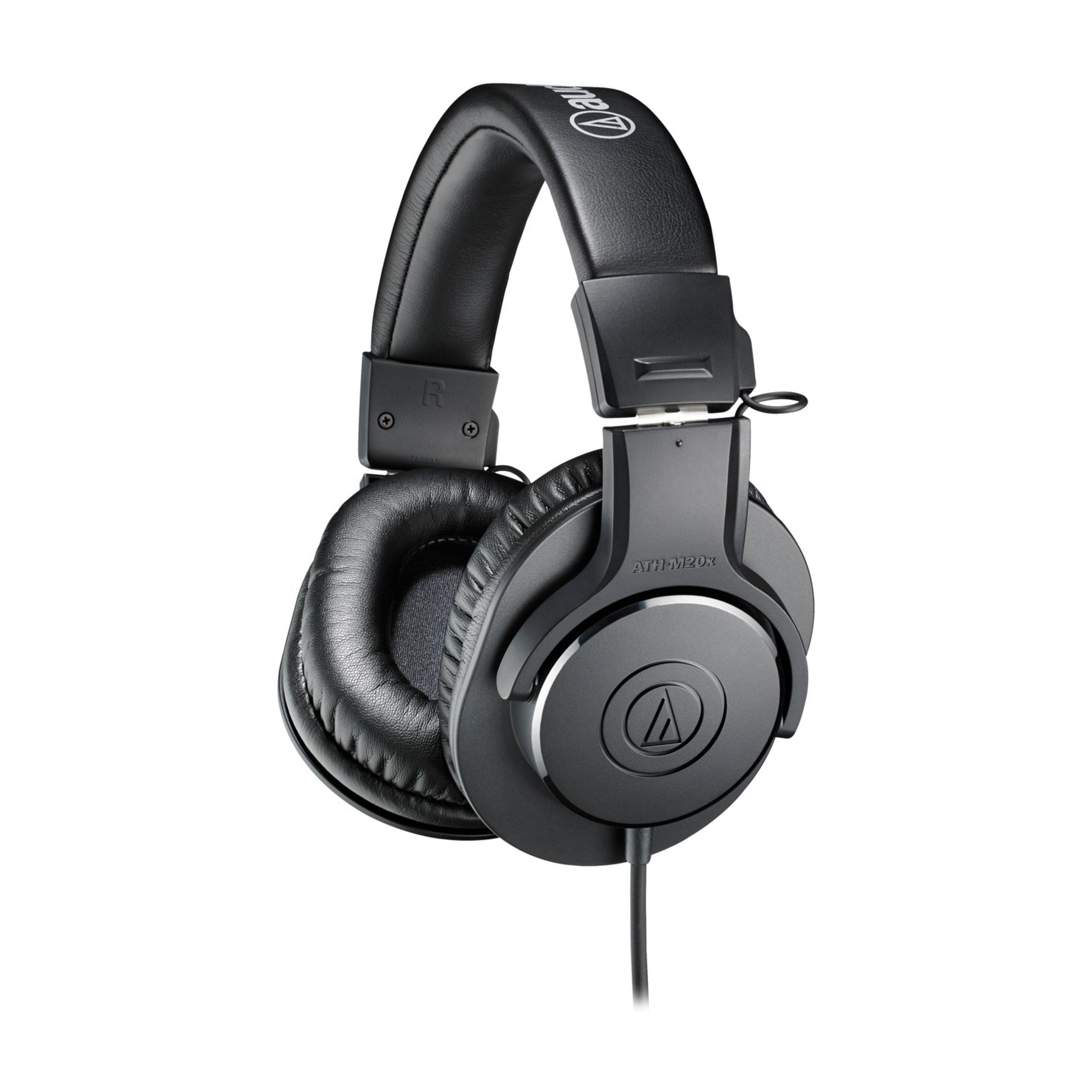 Auriculares negros con diadema y almohadillas acolchadas.