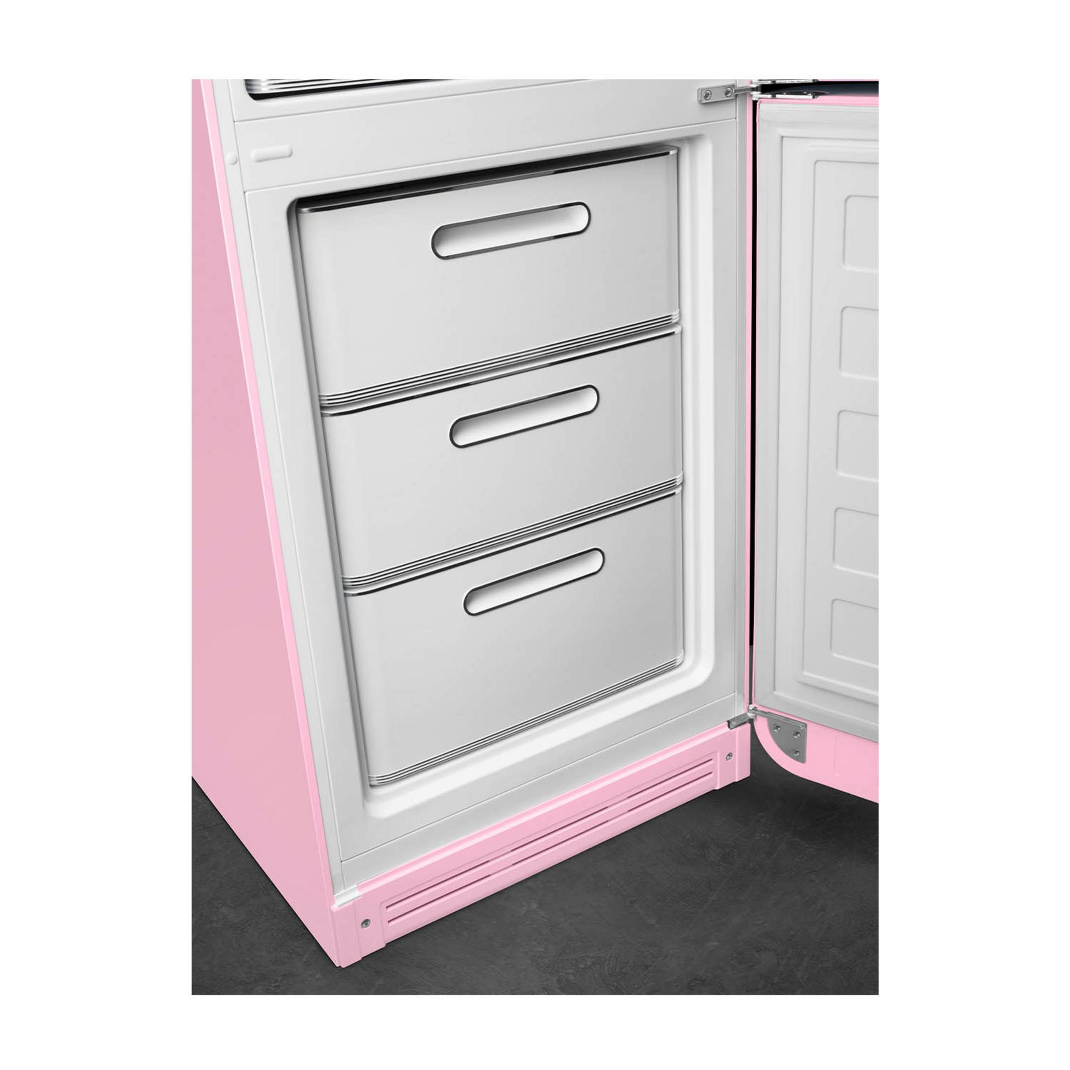 Refrigerador rosa con puertas abiertas y tres cajones visibles.