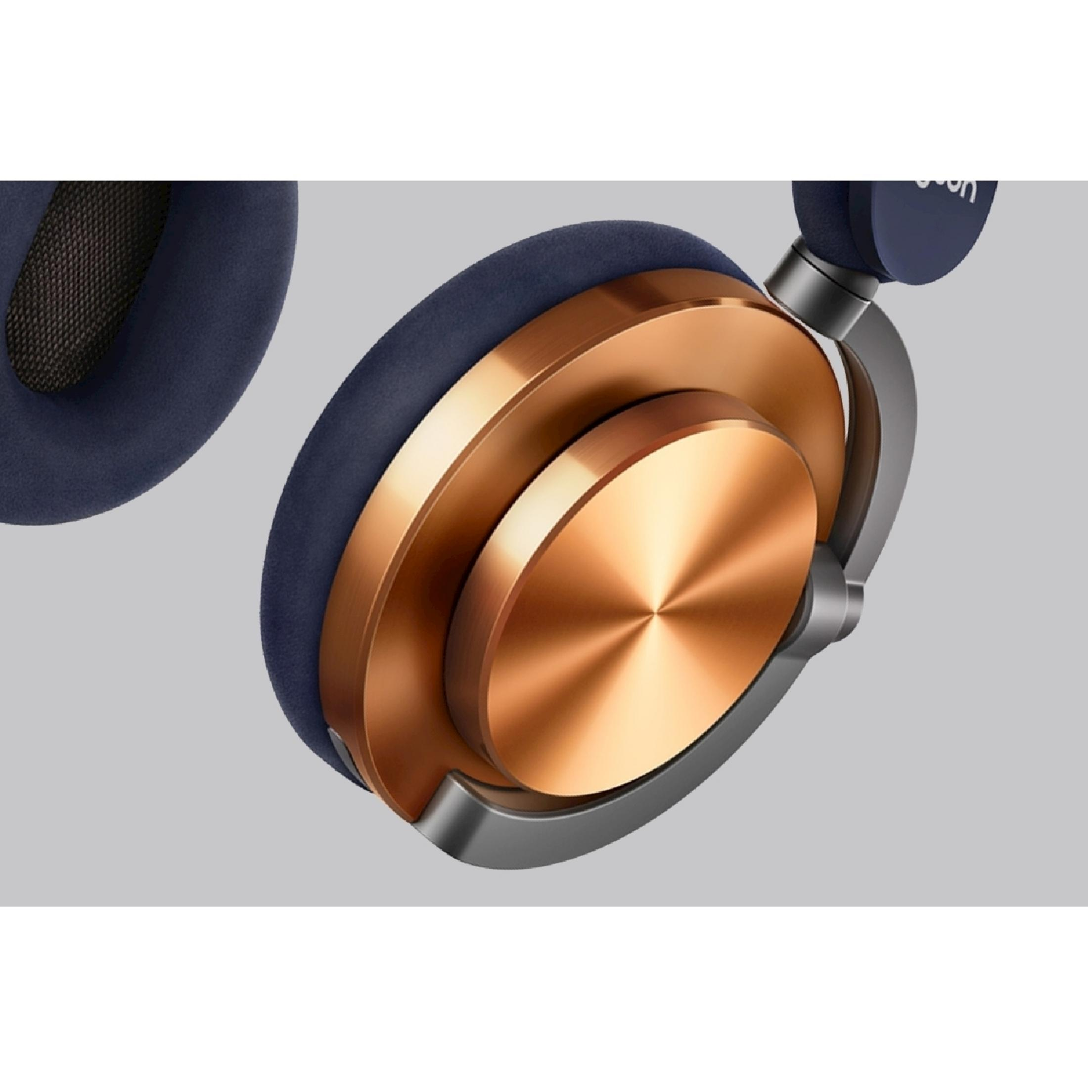 Słuchawki z ciemnoniebieskimi nausznikami i miedzianymi akcentami.