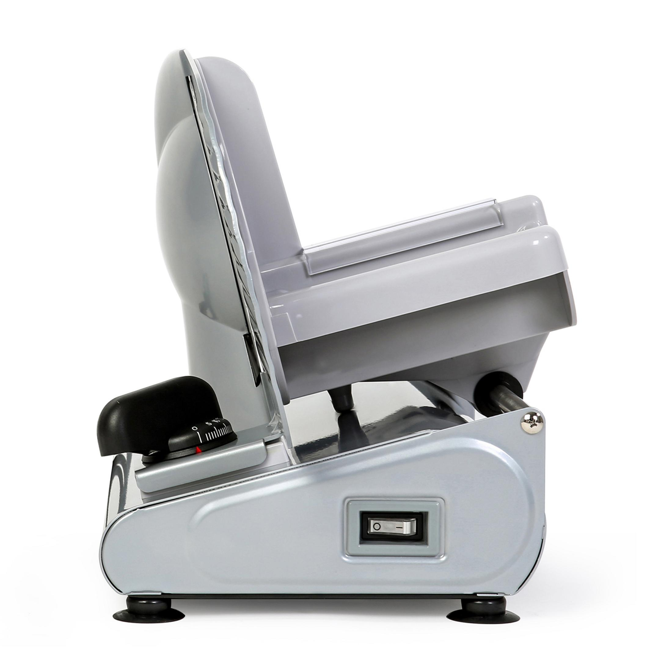 Szara krajalnica do mięsa z czarnym pokrętłem i włącznikiem.