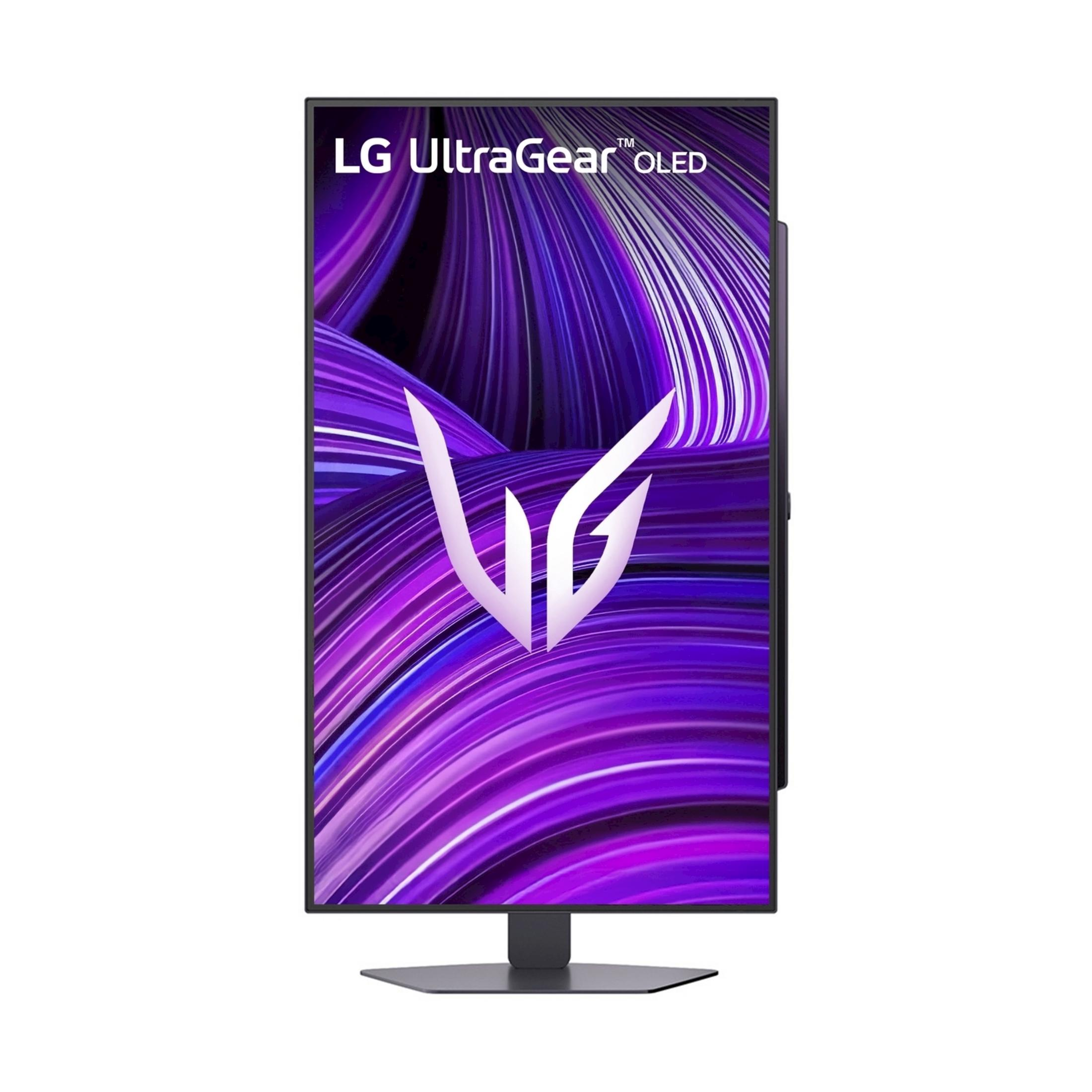 Monitor LG UltraGear OLED z fioletowym tłem i białym logo.