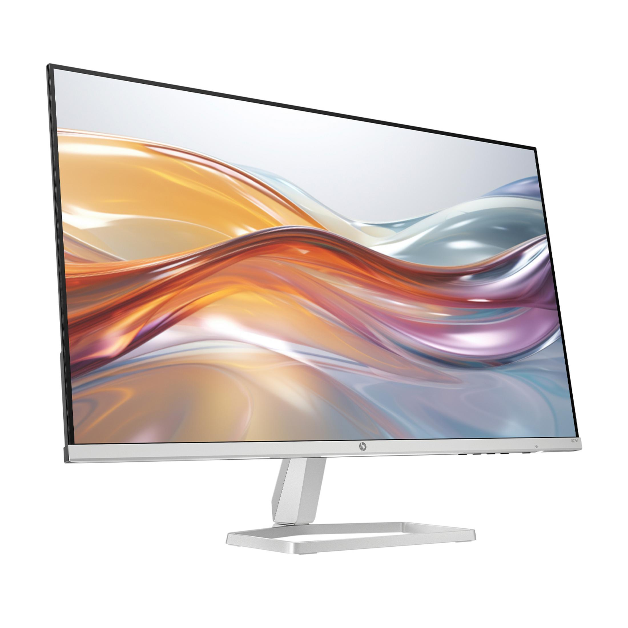 A silver computer monitor displaying a colorful, abstract background image.