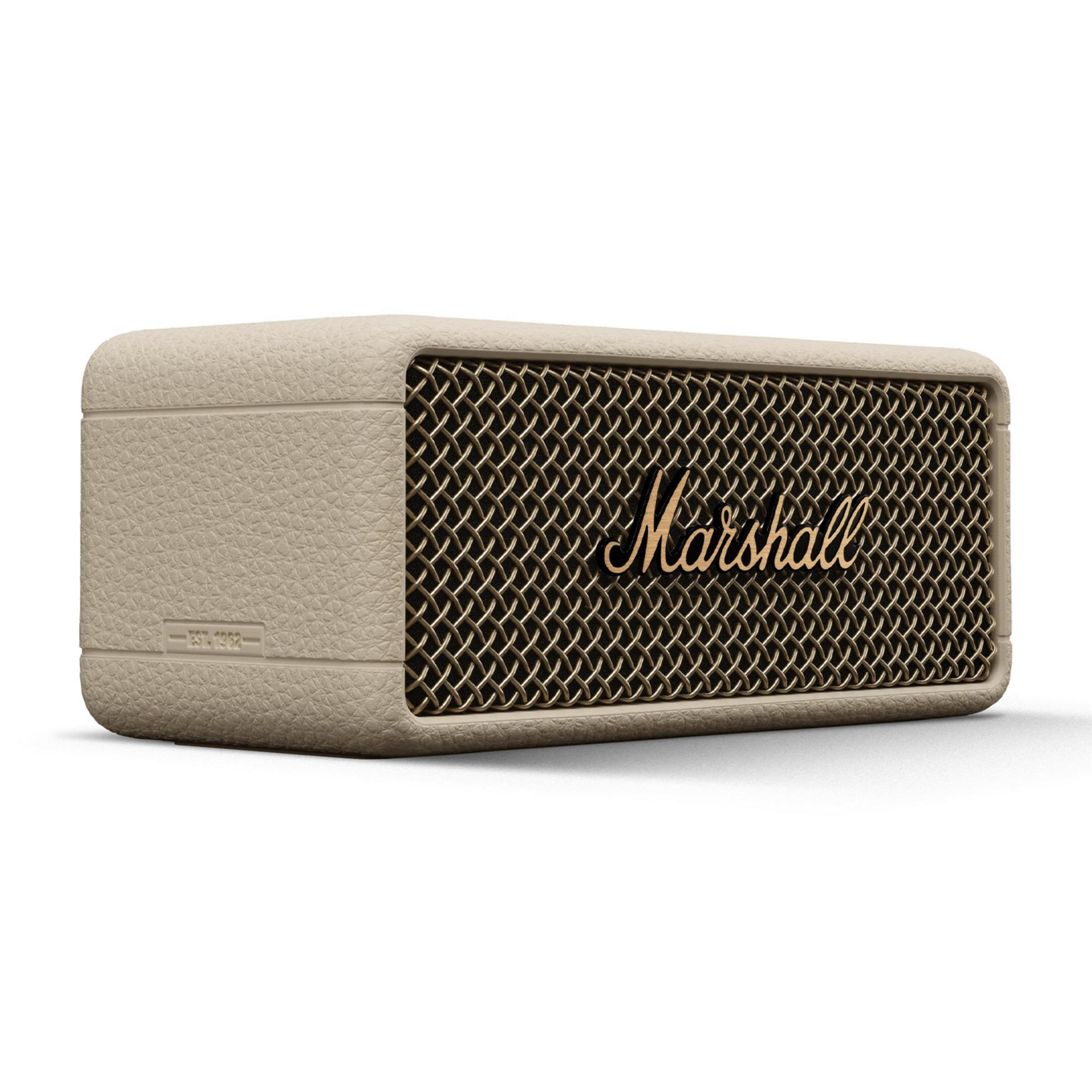Un altavoz Marshall beige con rejilla y logo dorados.