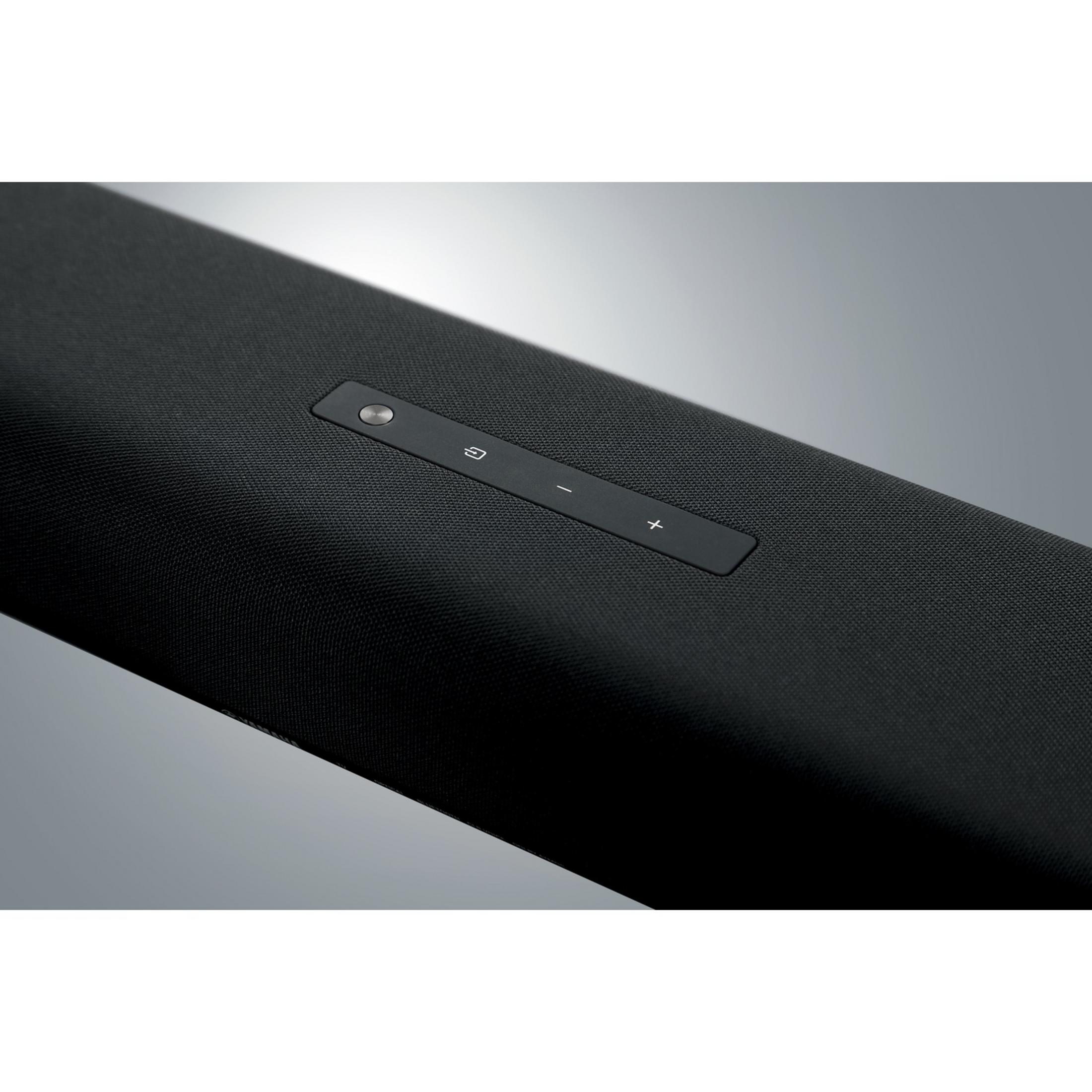 Black speaker with control buttons: Power, Volume Down, Volume Up.