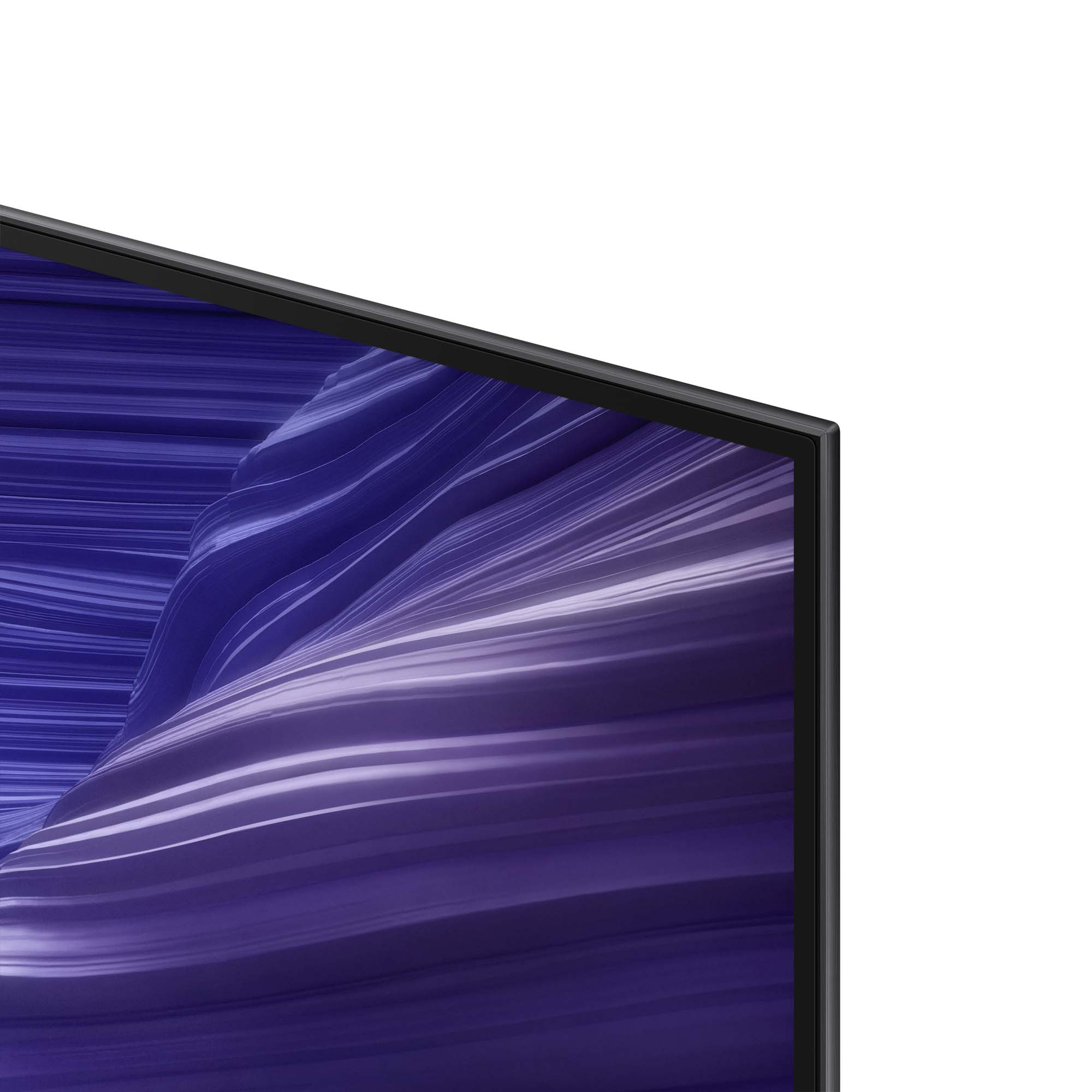 Zbliżenie ekranu telewizora z abstrakcyjnym, falistym wzorem w kolorach fioletowym i białym.