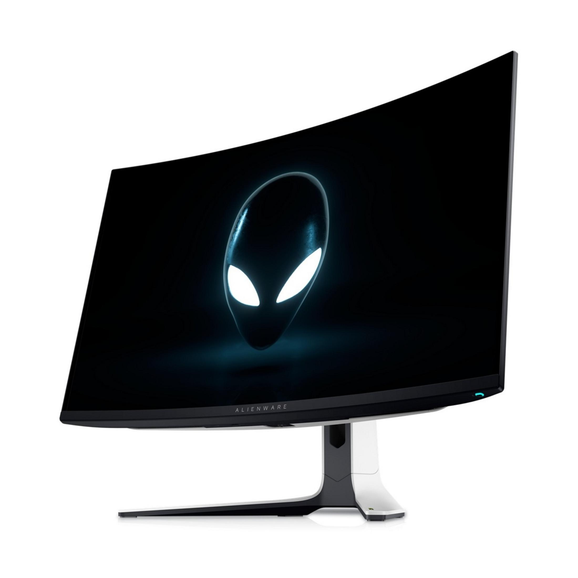 Zakrzywiony monitor Alienware wyświetlający świecące logo głowy obcego.