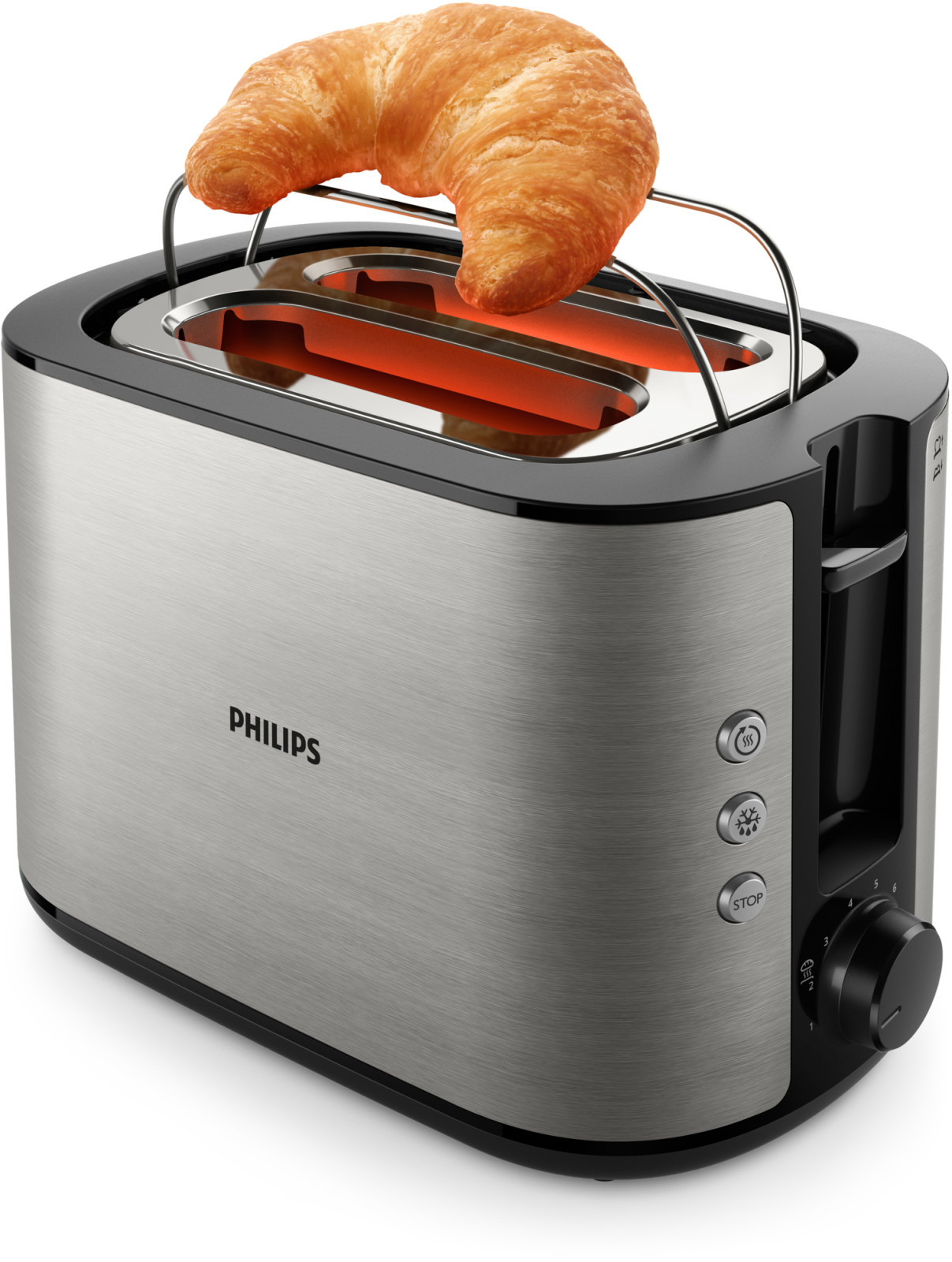 Ein silberner Philips-Toaster mit einem Croissant, das auf den warmen Heizstäben liegt.
