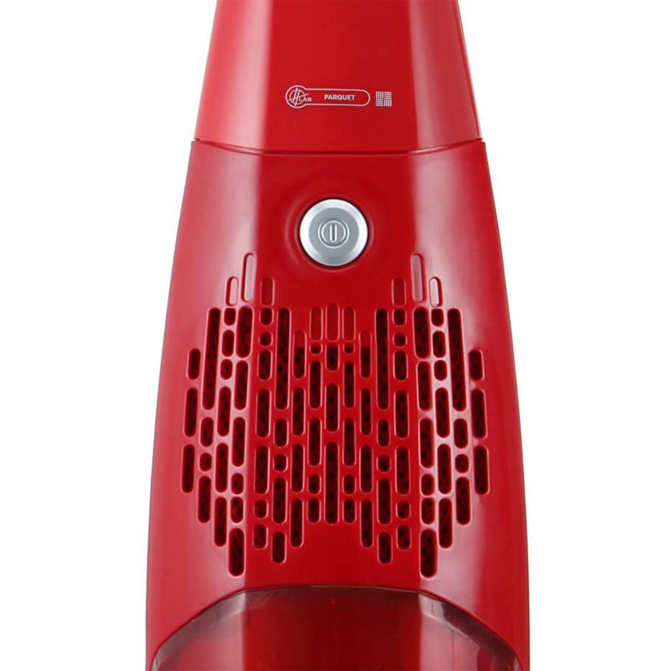 Aspirapolvere rosso, primo piano della griglia di ventilazione e del pulsante.