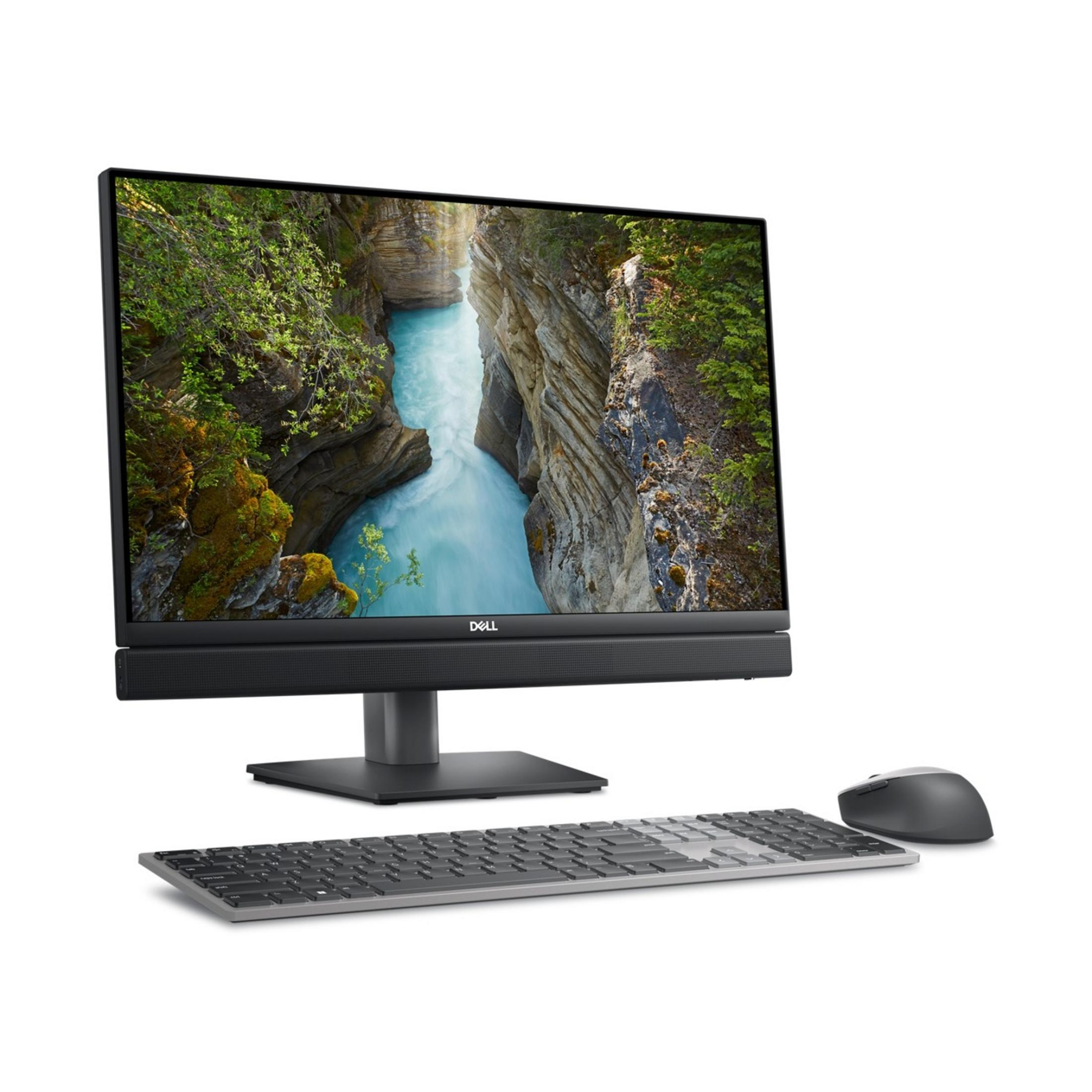 Un PC All-in-One Dell con tastiera e mouse che mostra una cascata in un canyon.
