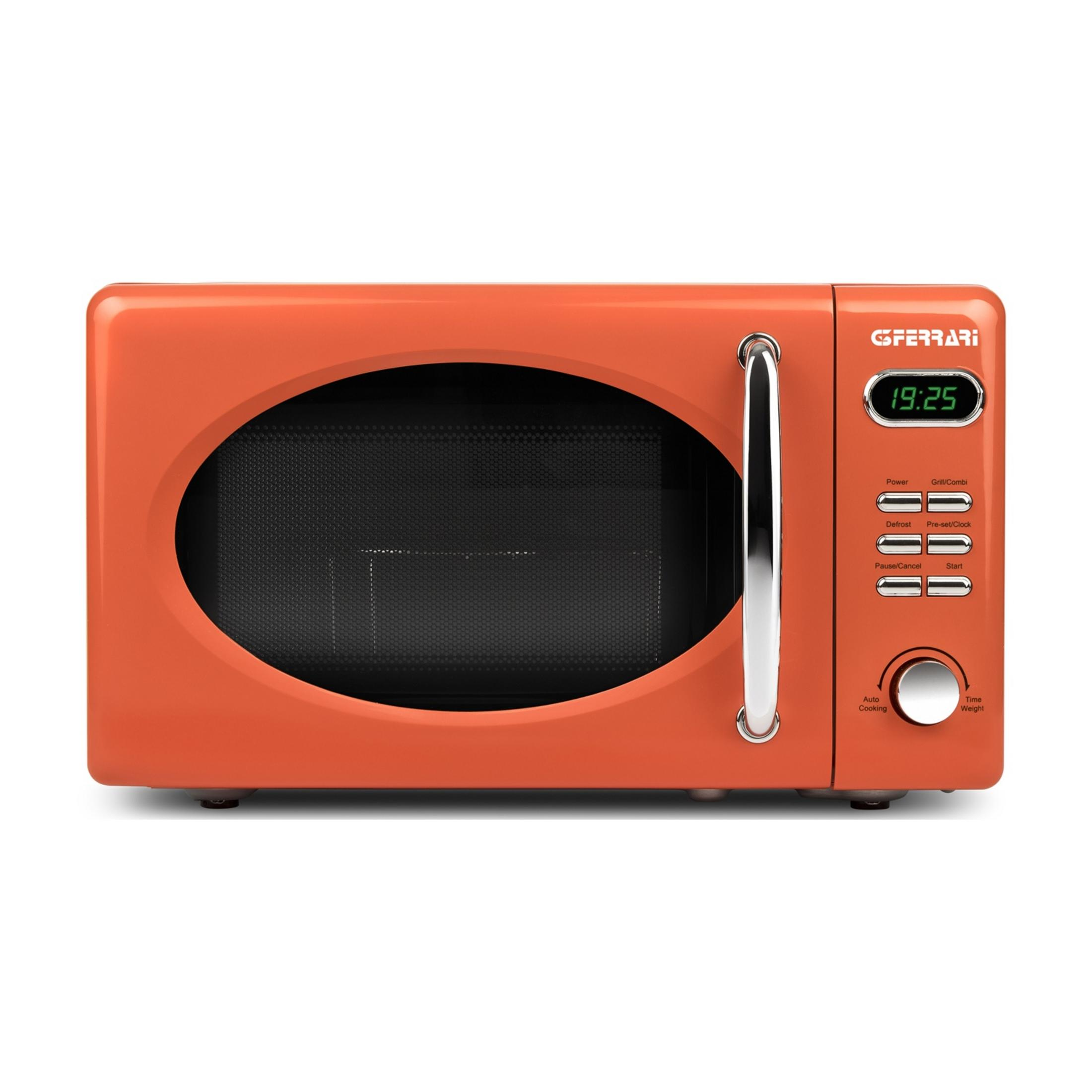 Pomarańczowy, retro kuchenka mikrofalowa z srebrną rączką i panelem sterowania.