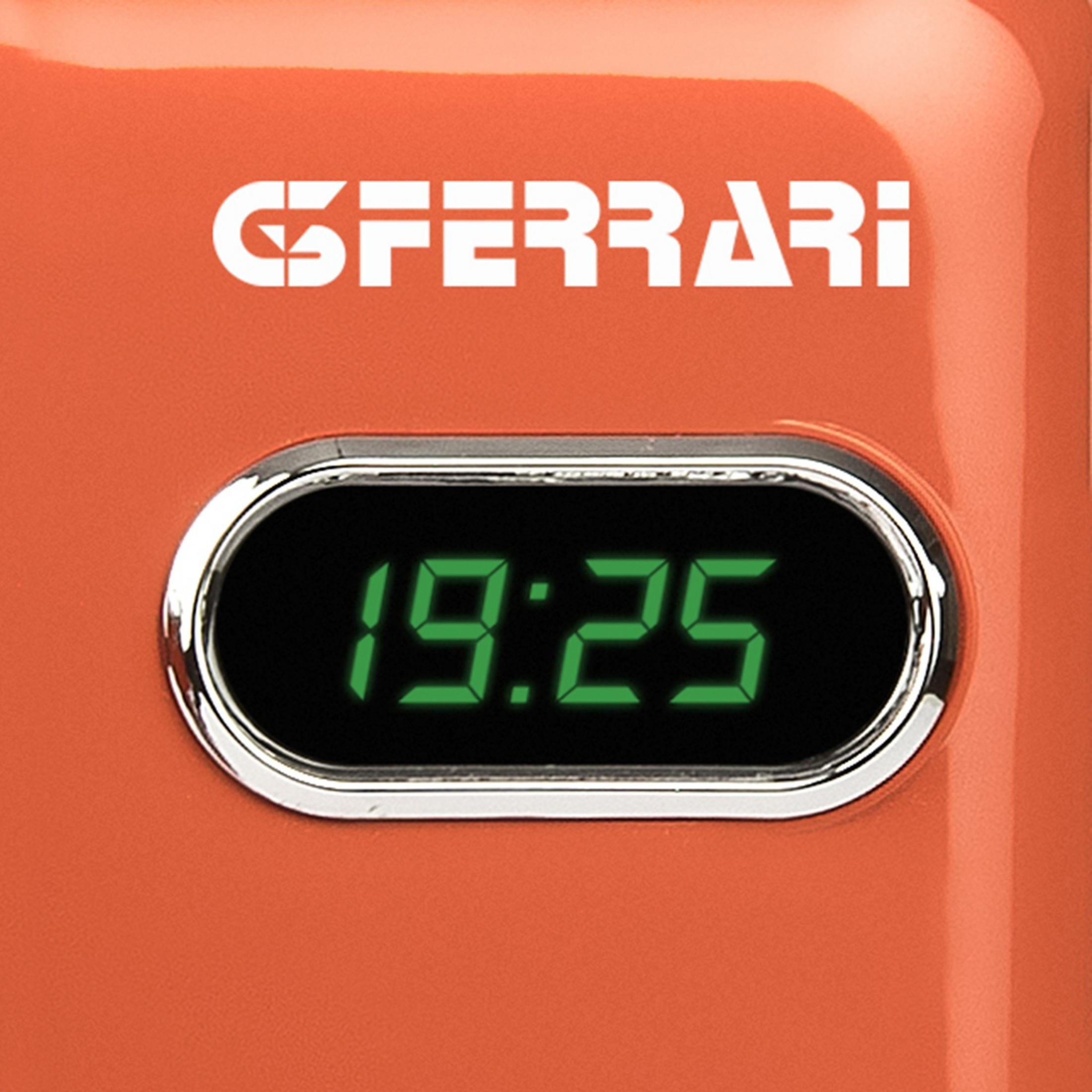 Pomarańczowa obudowa z białym logo Ferrari i cyfrowym wyświetlaczem 19:25.