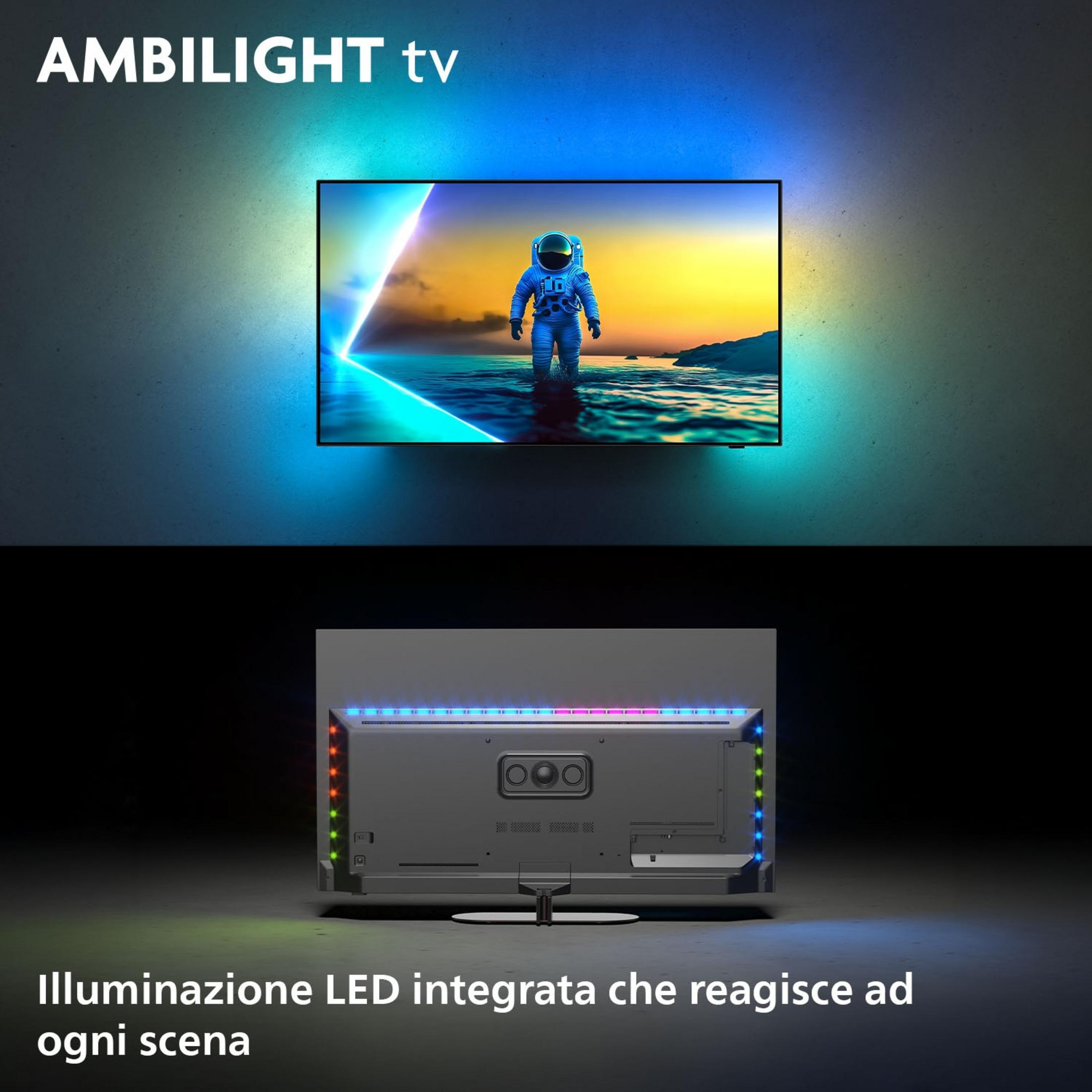 Astronauta stoi w wodzie przed telewizorem z oświetleniem Ambilight.