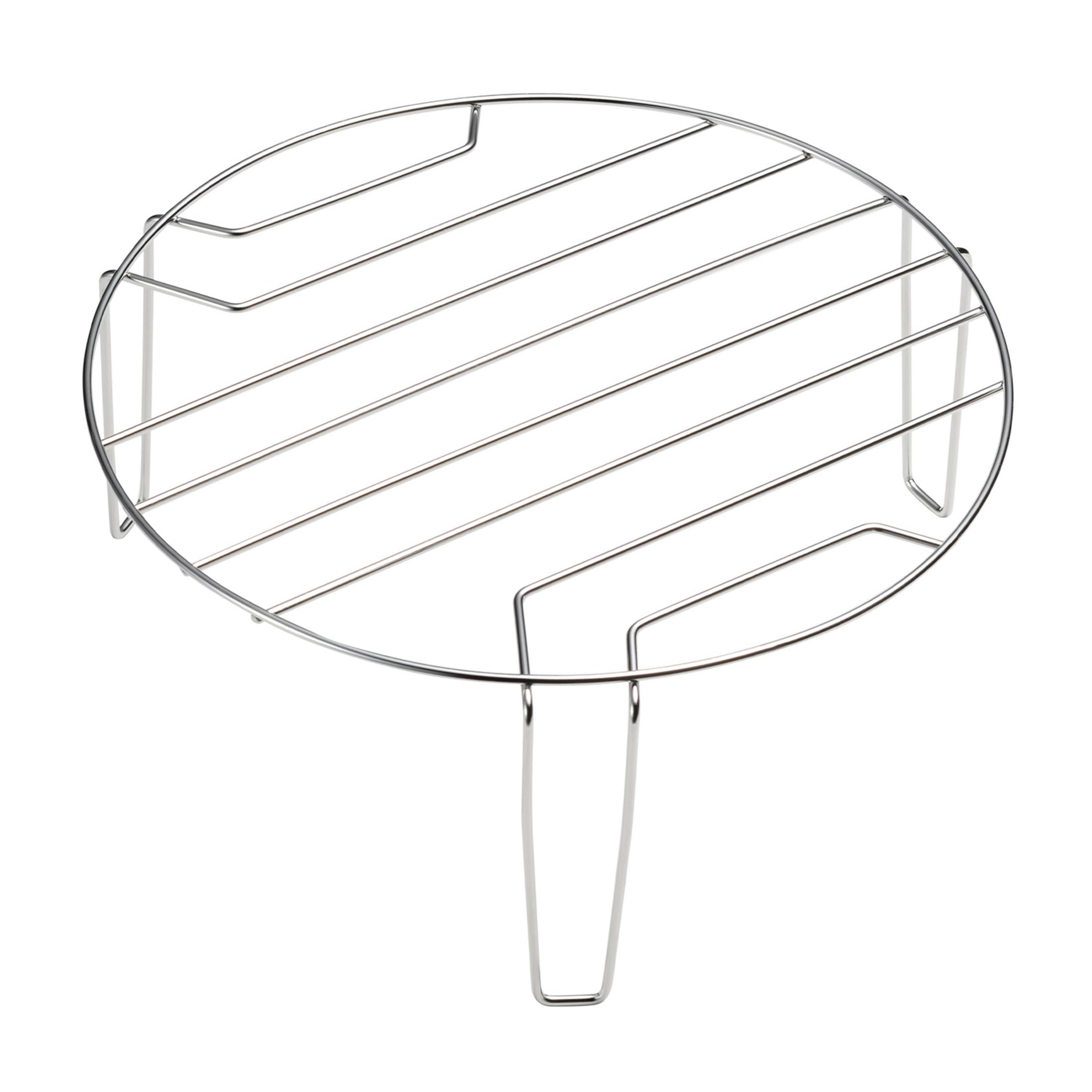 Okrągły, srebrny metalowy ruszt z trzema nóżkami w kształcie litery U.