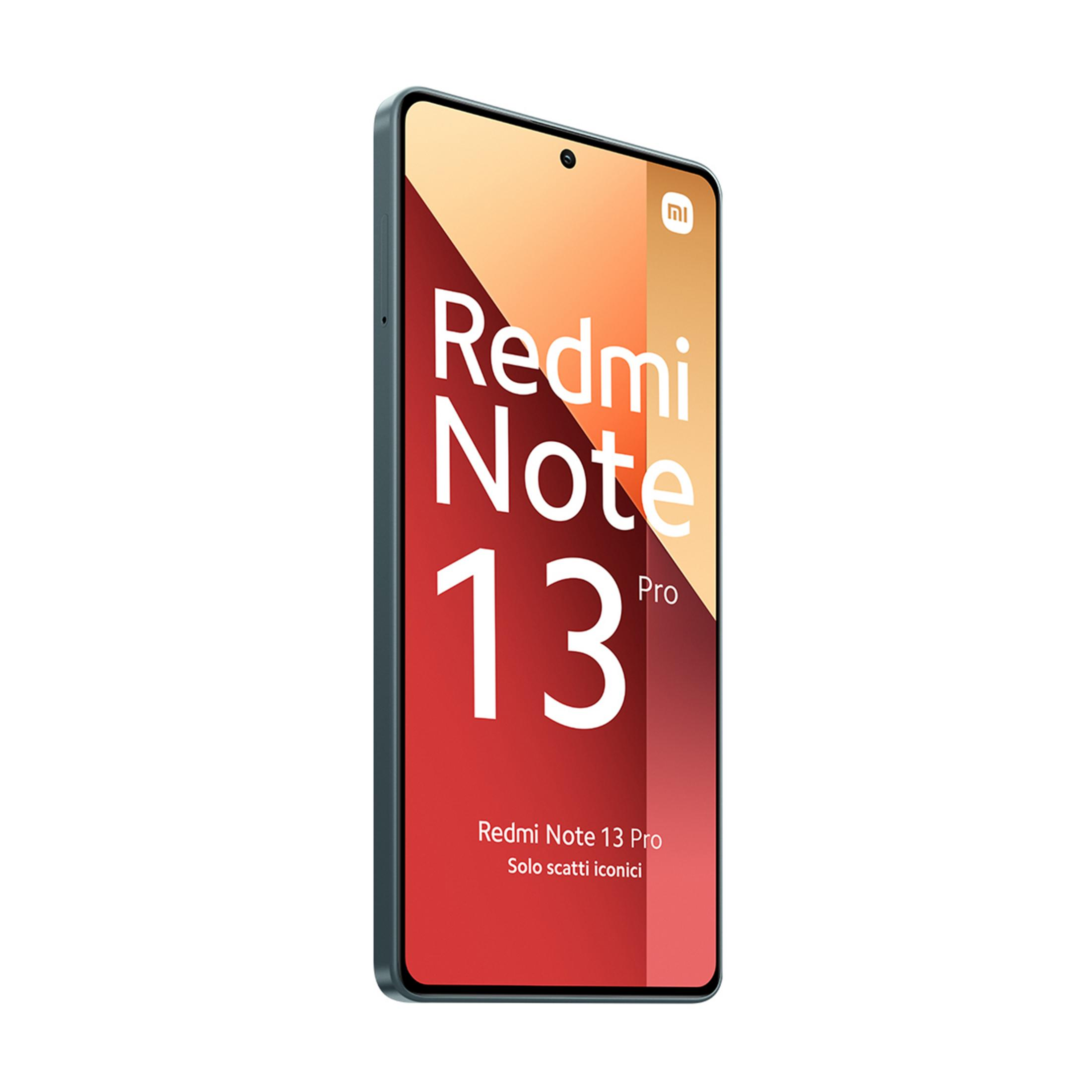 Smartfon z napisem Redmi Note 13 Pro. Czerwone tło.