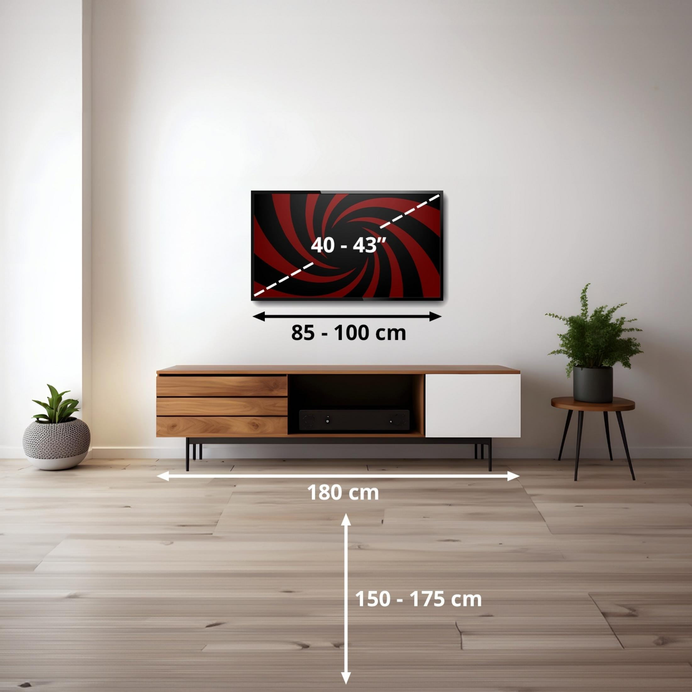 Un mueble de TV con cajones y un compartimento abierto, junto a plantas.