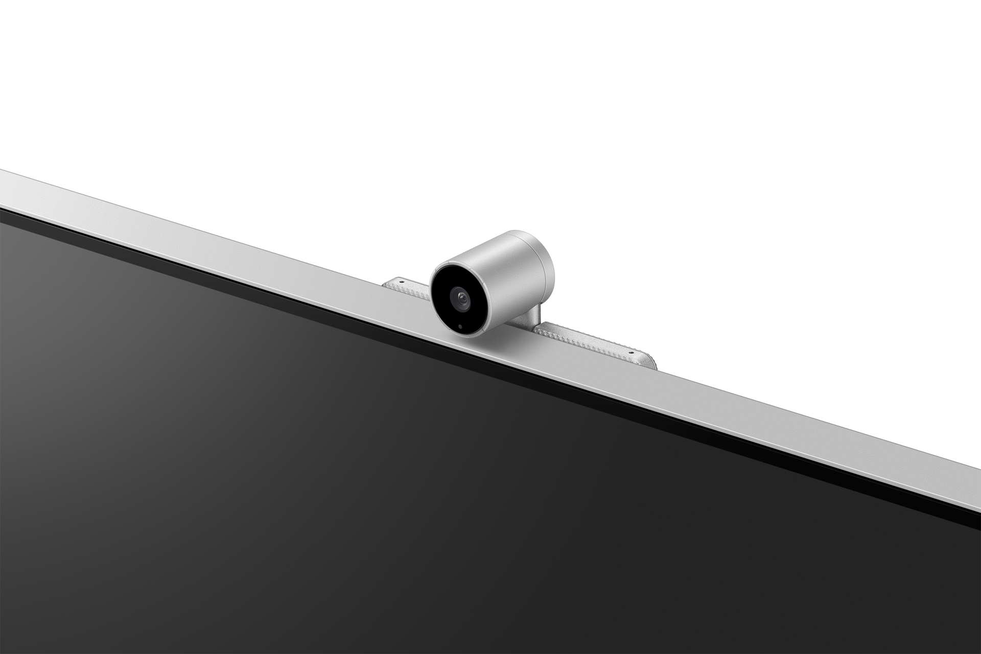 Srebrna kamera internetowa jest przymocowana do ekranu laptopa.