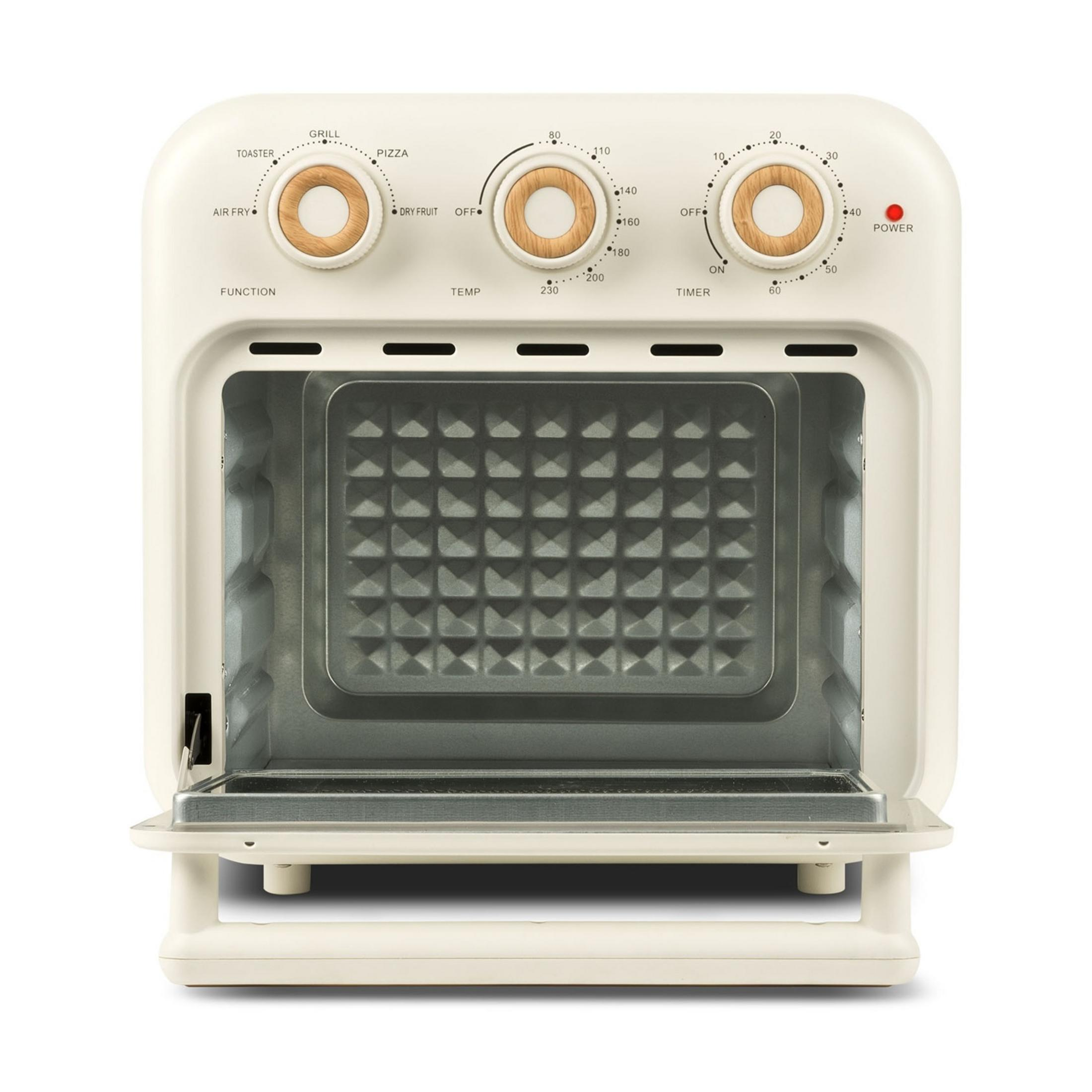 Ein cremefarbener Toaster-Ofen mit offenen Türen und sichtbaren Kochplatten.