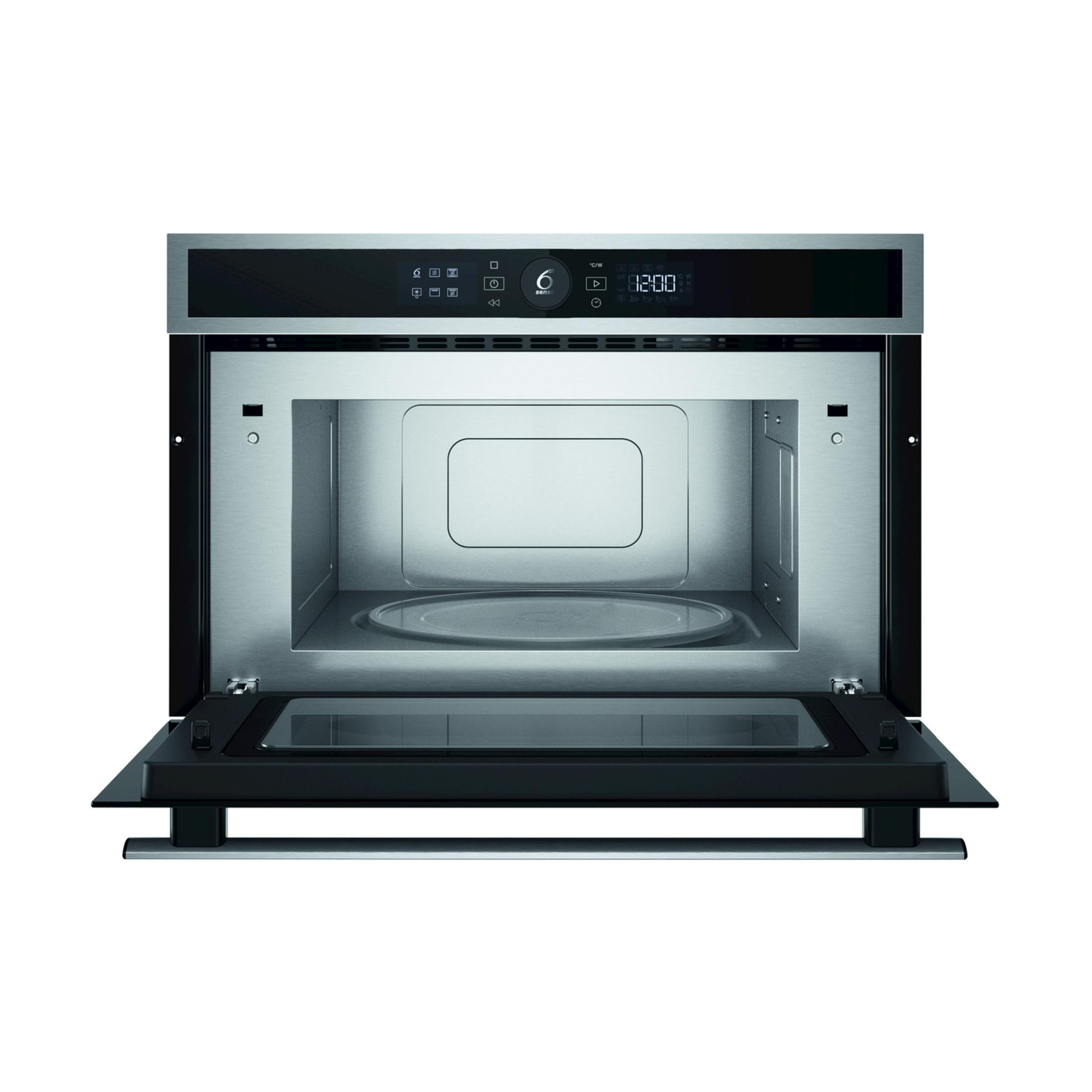 Horno microondas empotrable abierto con pantalla digital y plato giratorio.