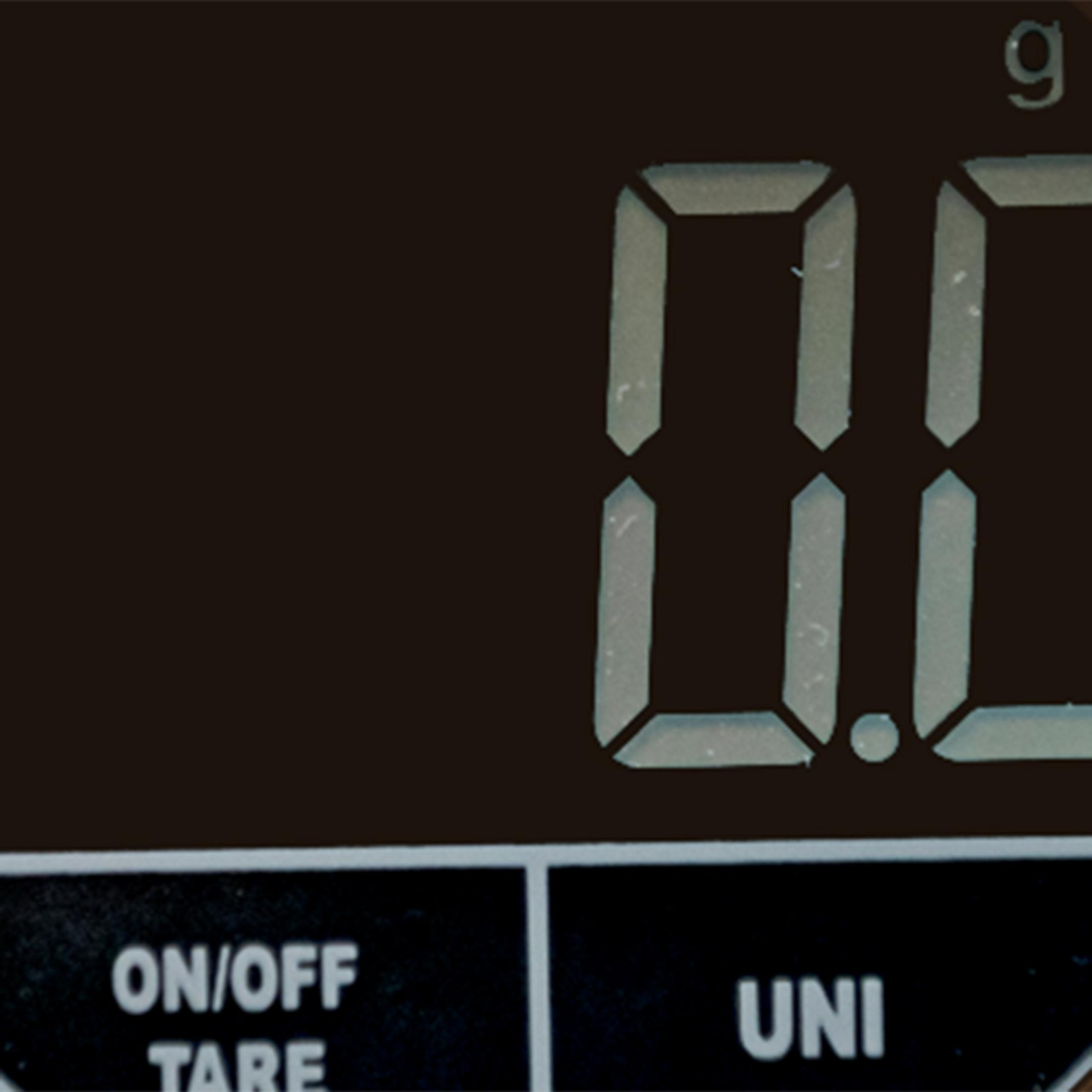 Digitalwaage zeigt 0.0g an. Tasten: ON/OFF TARE, UNI.