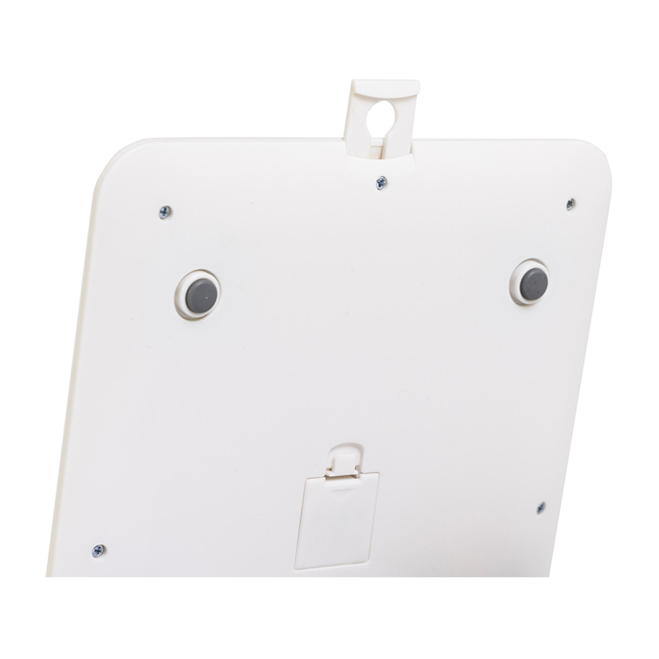 Back of a white device with rubber feet and a kickstand.