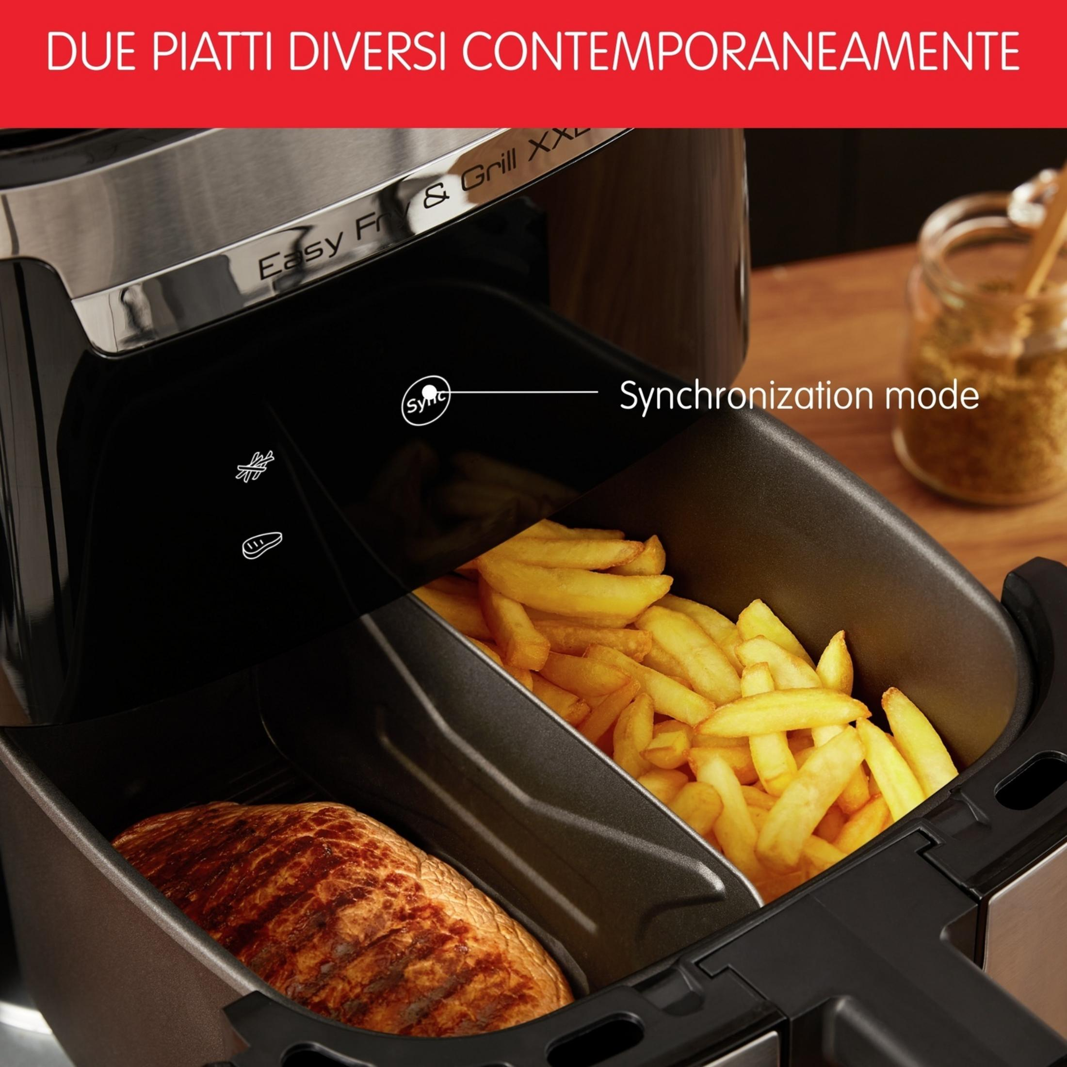 A dual-basket air fryer with meat and fries. Synchronization mode is active.