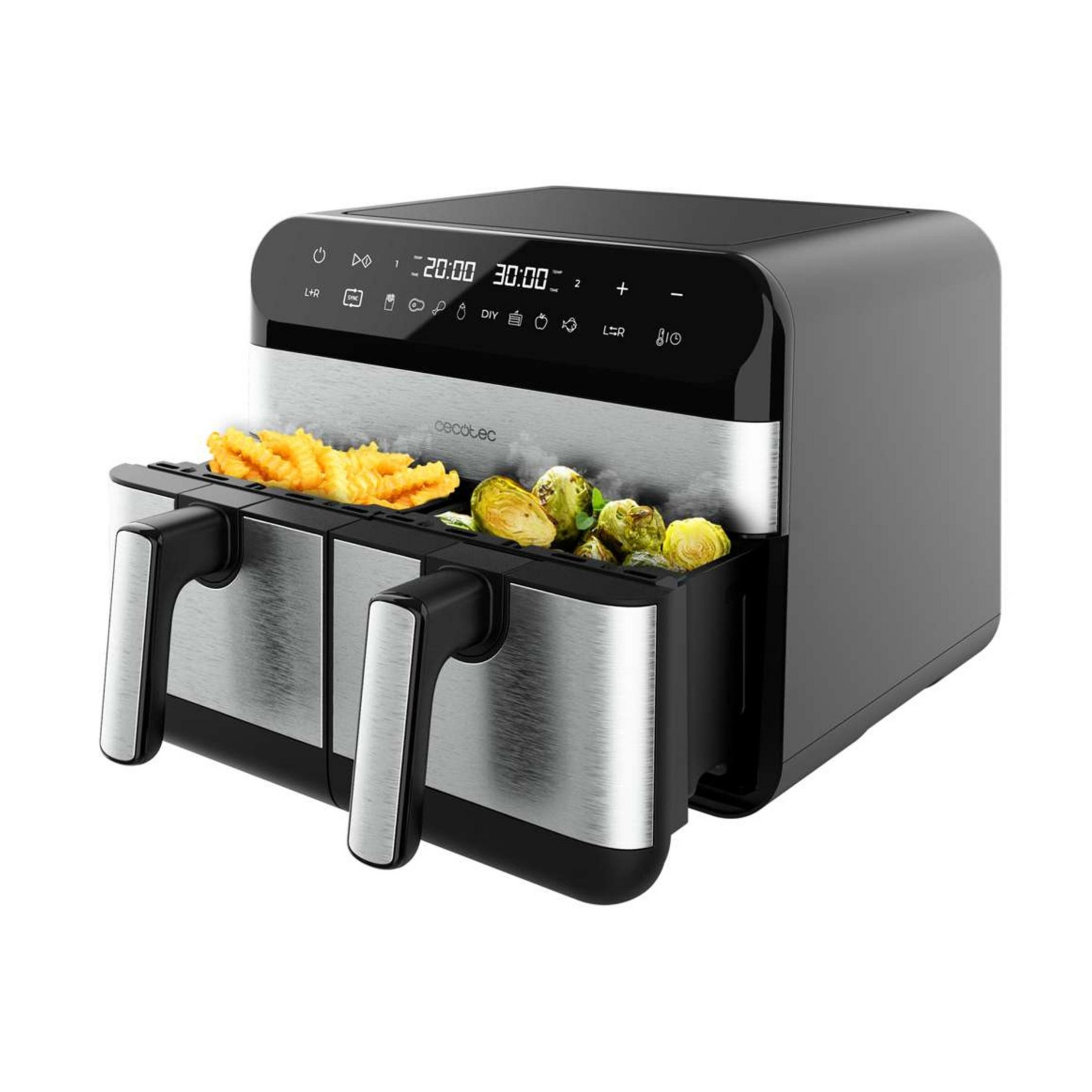 Een zwarte airfryer met twee lades, gevuld met friet en groenten.