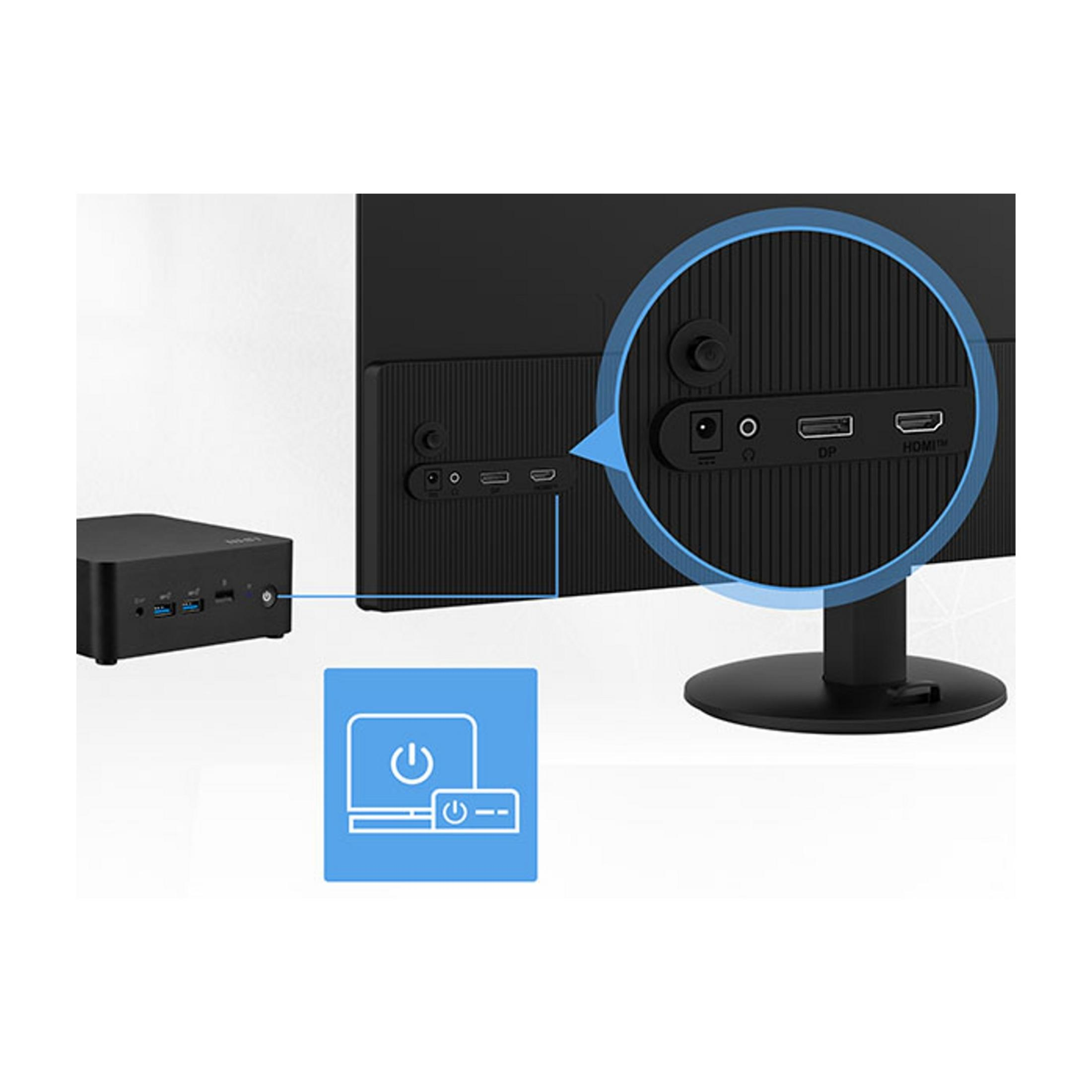 A small black computer next to a monitor showing ports and connections.