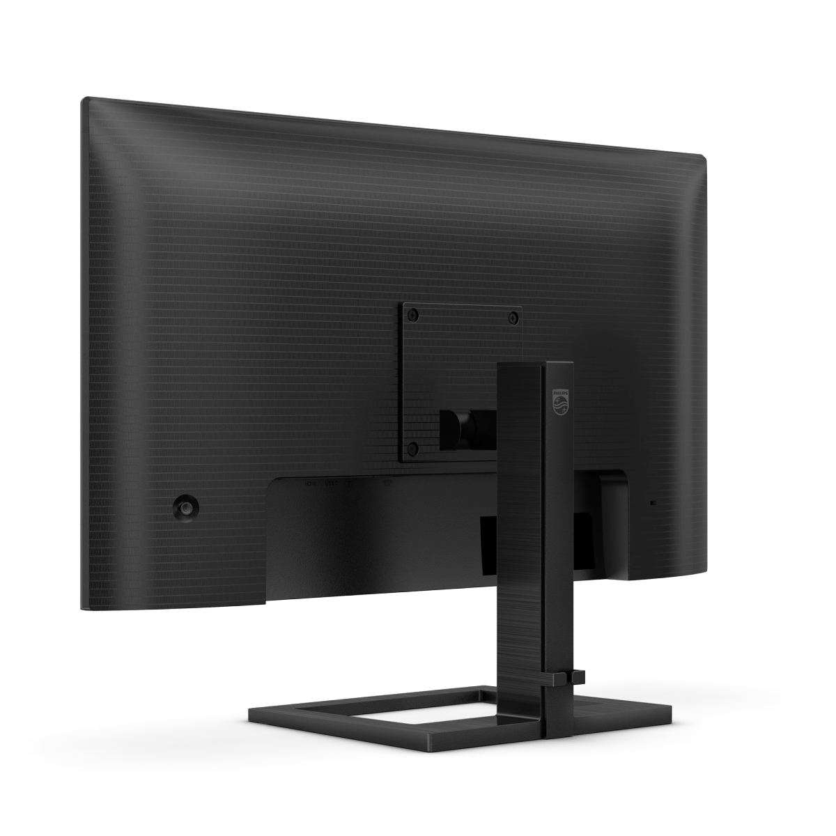 Widok z tyłu czarnego monitora ze stojakiem. Widoczne są porty.