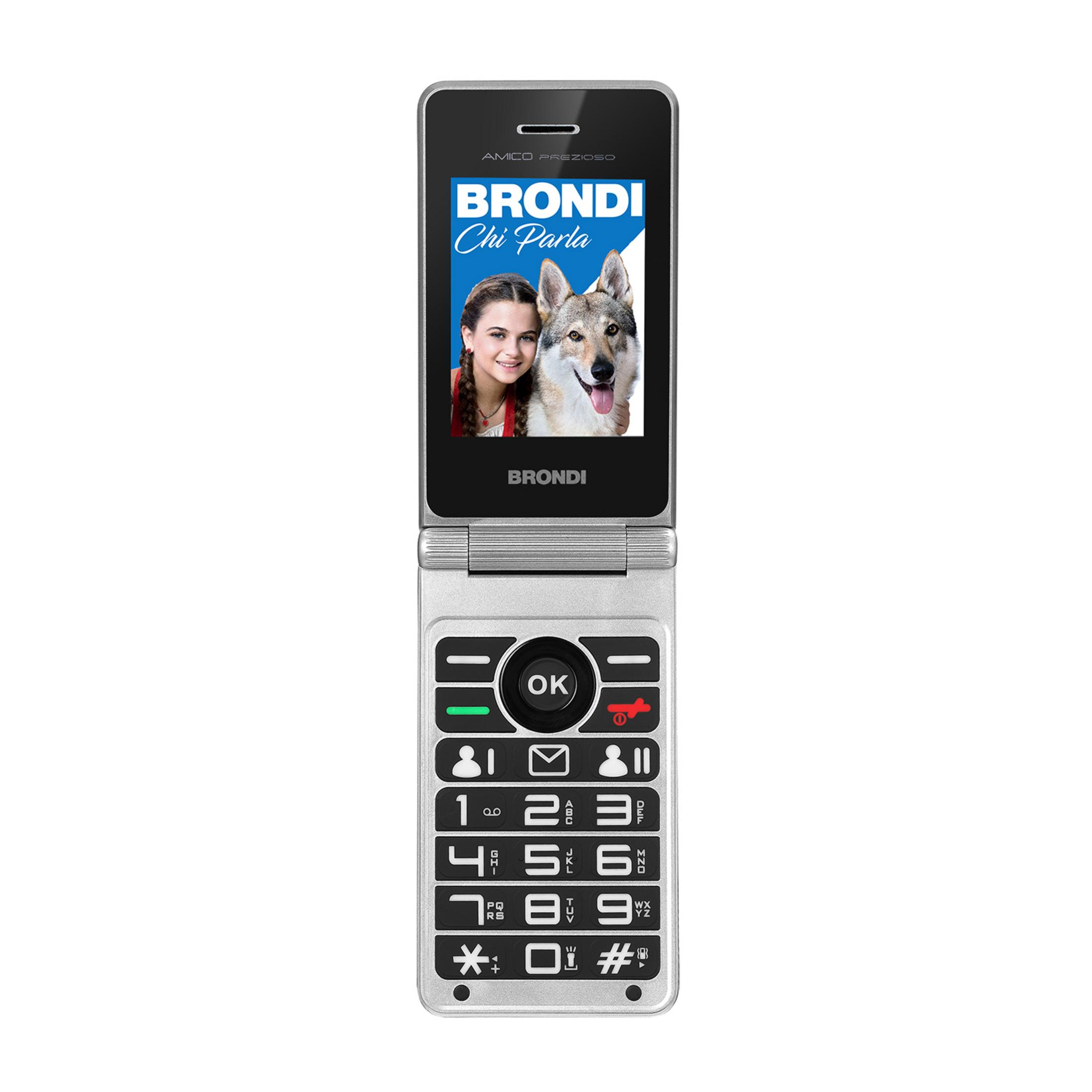 Un teléfono plegable plateado con imagen de niña y lobo en pantalla. Botones abajo.