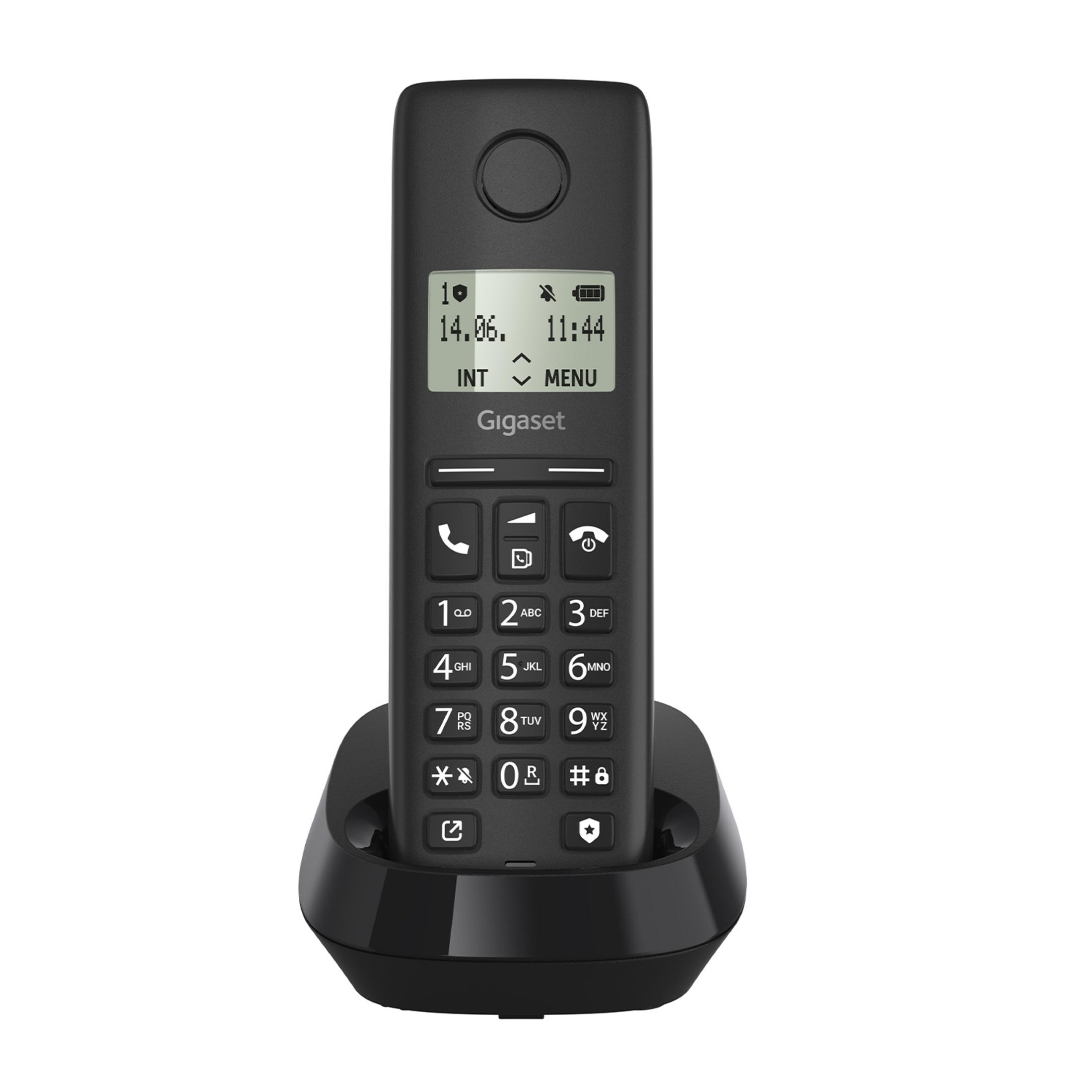 Un telefono cordless Gigaset nero sulla sua base di ricarica.