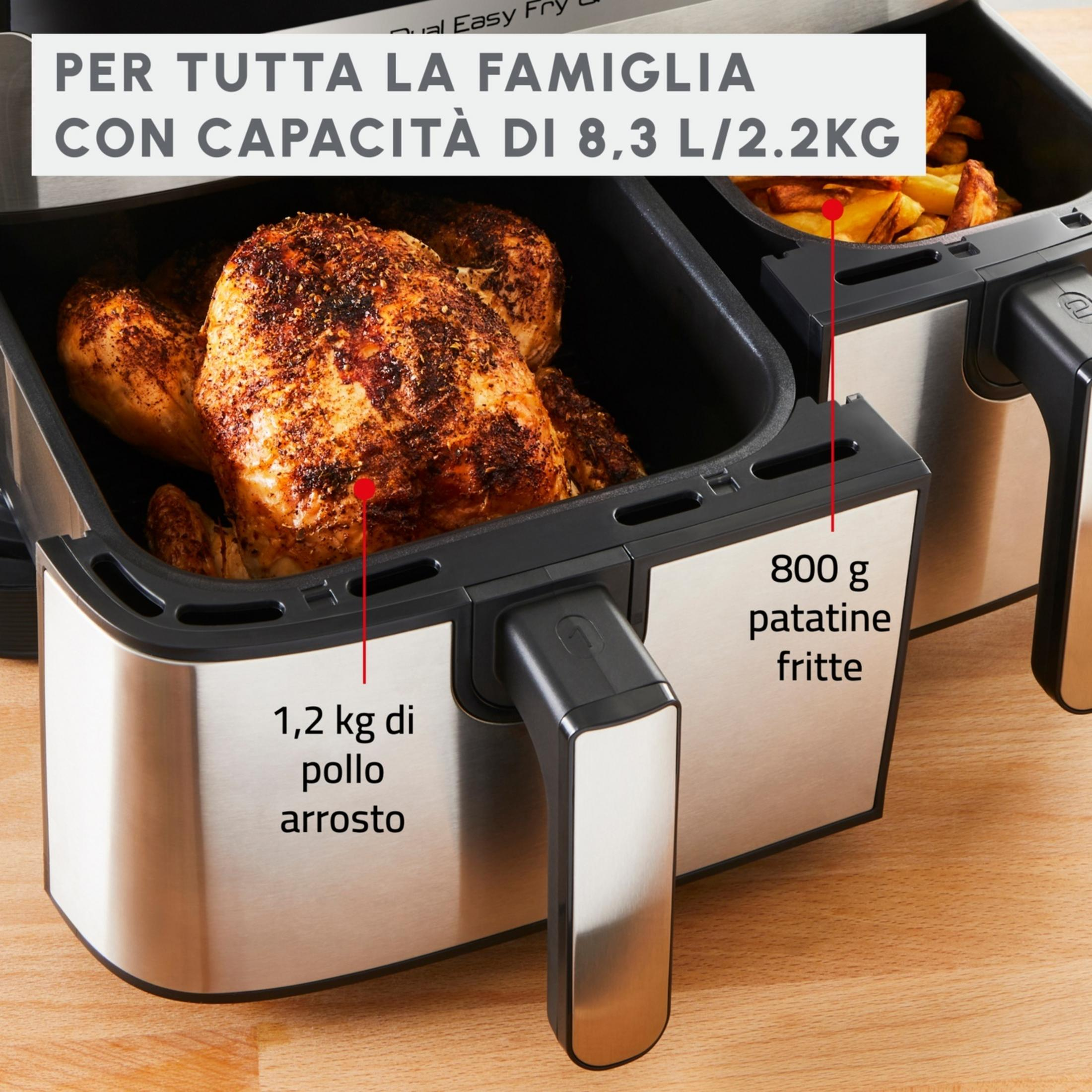 Friteuse à air double avec poulet rôti et frites.