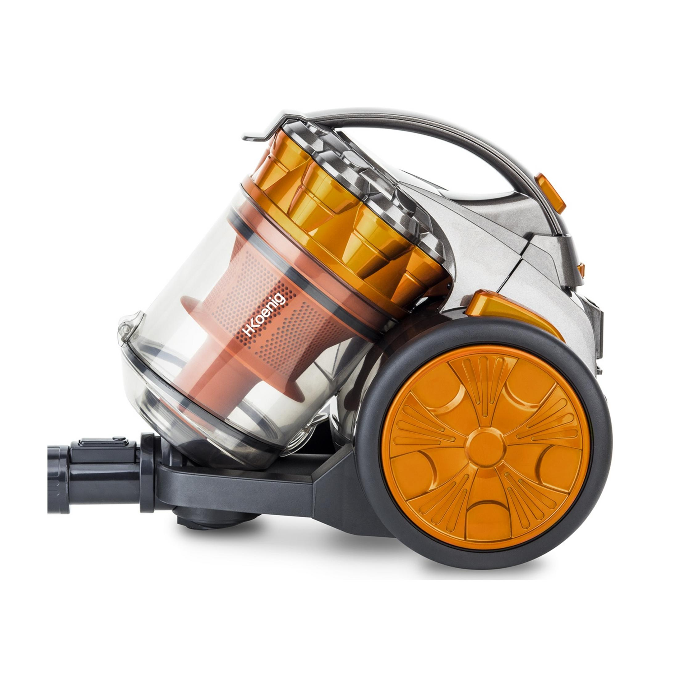 Srebrny i pomarańczowy odkurzacz z przezroczystym pojemnikiem i dużymi kołami.