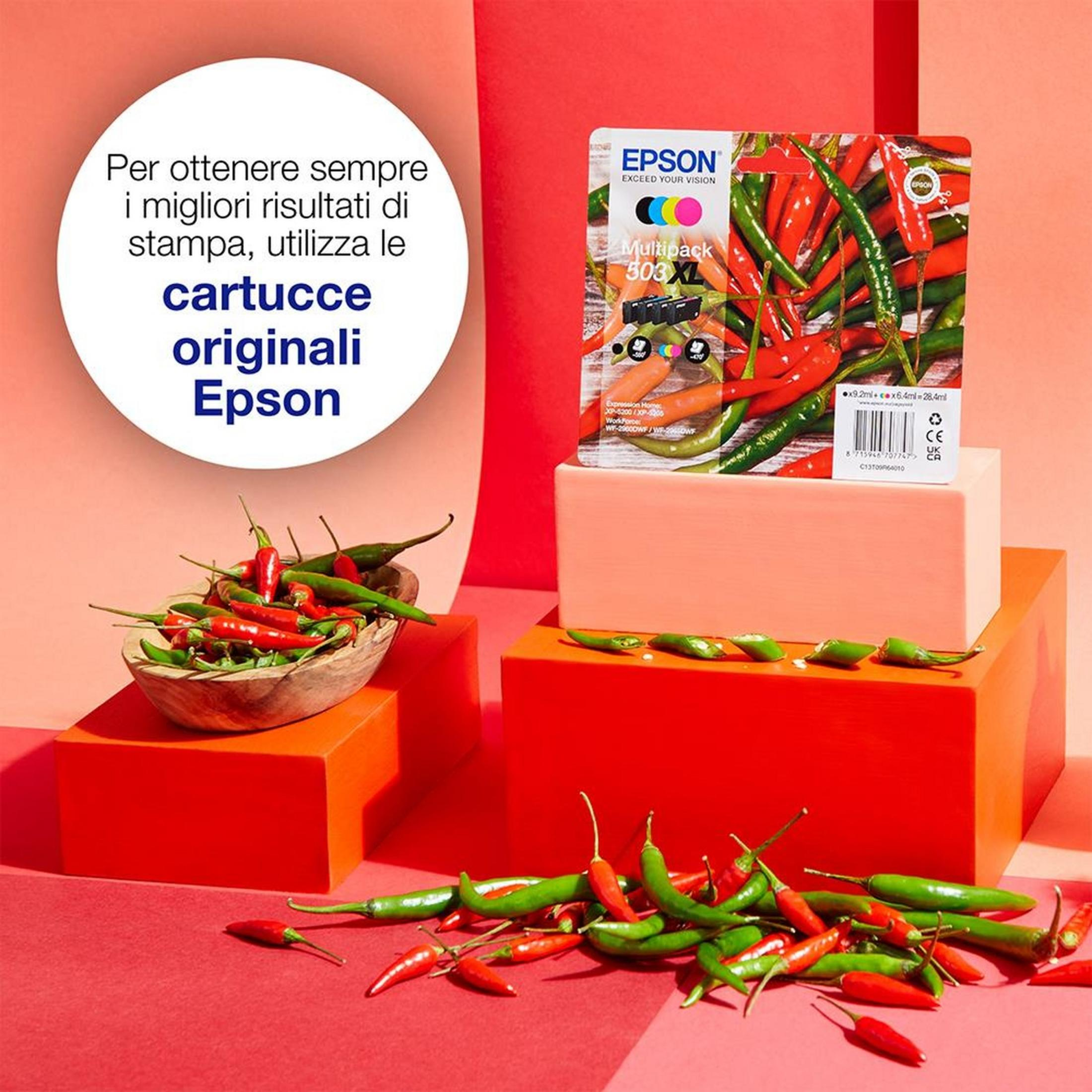 Czerwone i zielone papryczki chili na czerwonych i pomarańczowych blokach. Multipack tuszu Epson.