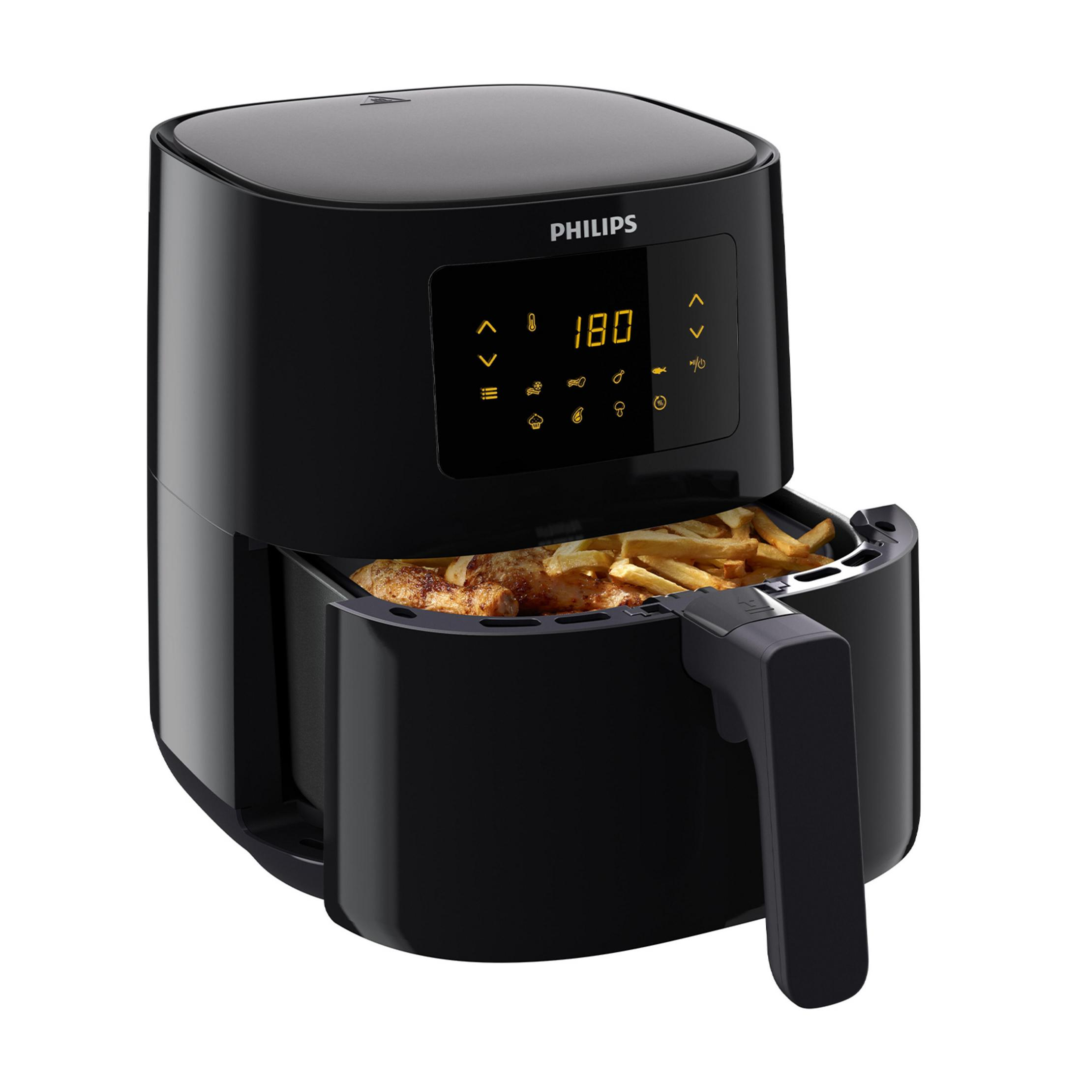 Friggitrice ad aria nera con cosce di pollo e patatine fritte.