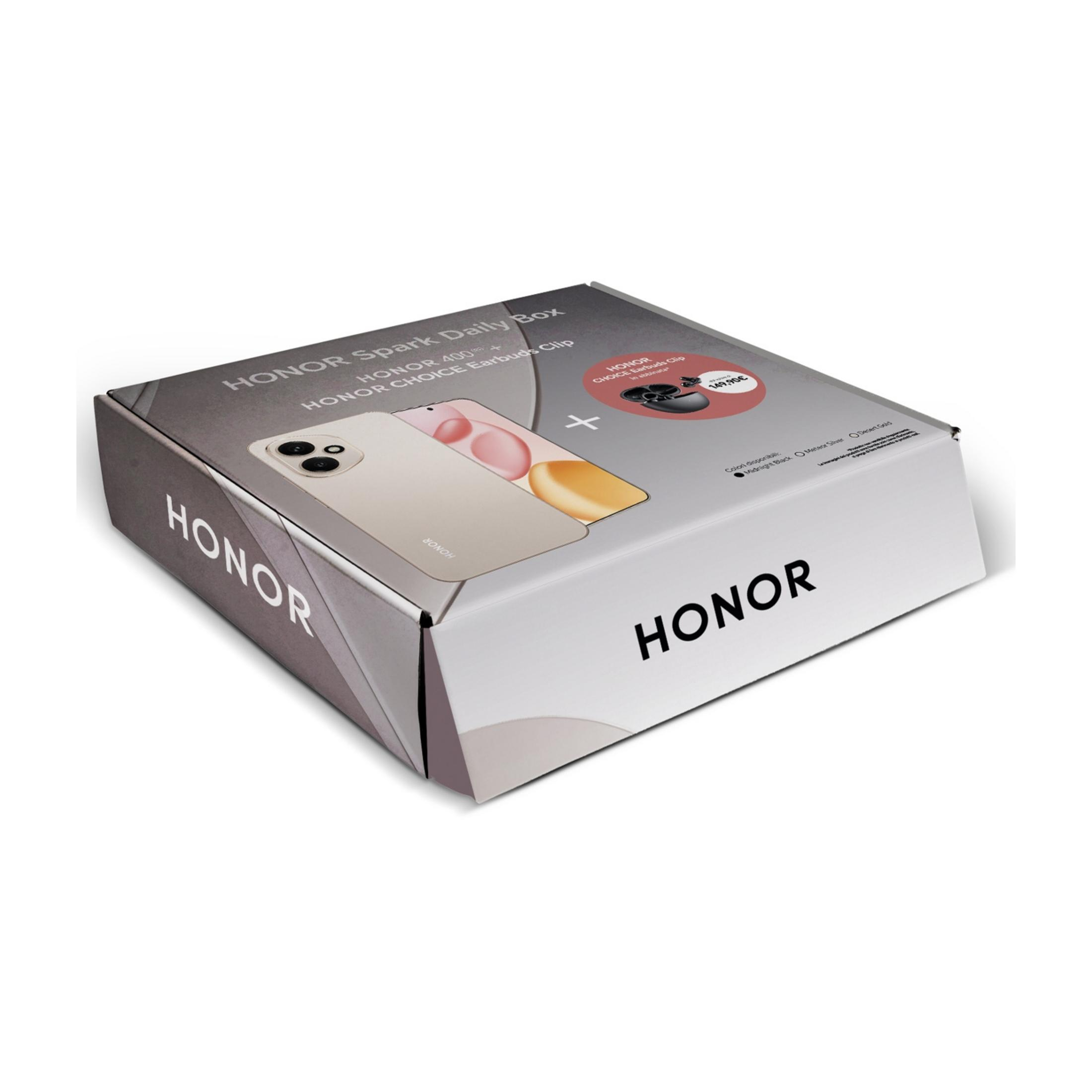 Pudełko z logo HONOR, smartfonem i słuchawkami. Białe tło.