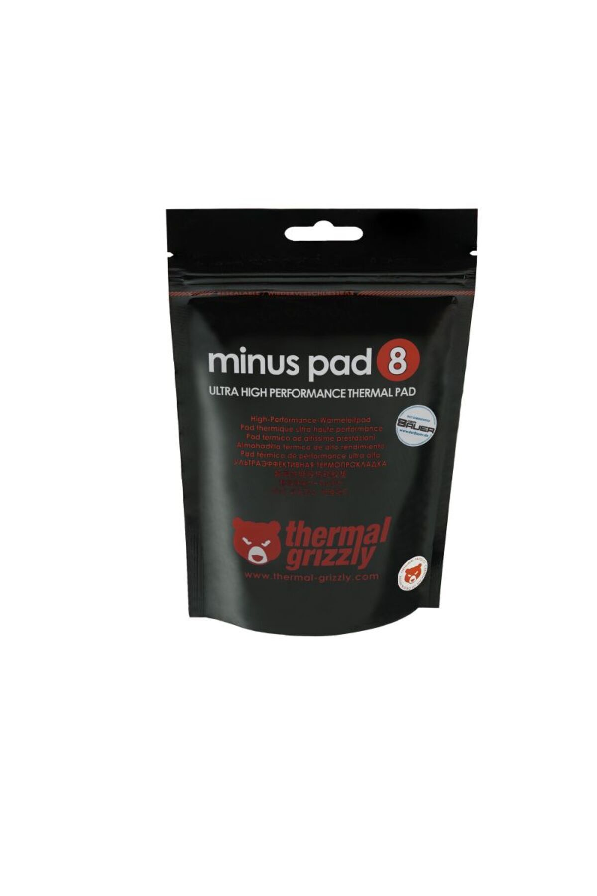 "minus pad 8" ve "thermal grizzly" logolu siyah poşet.