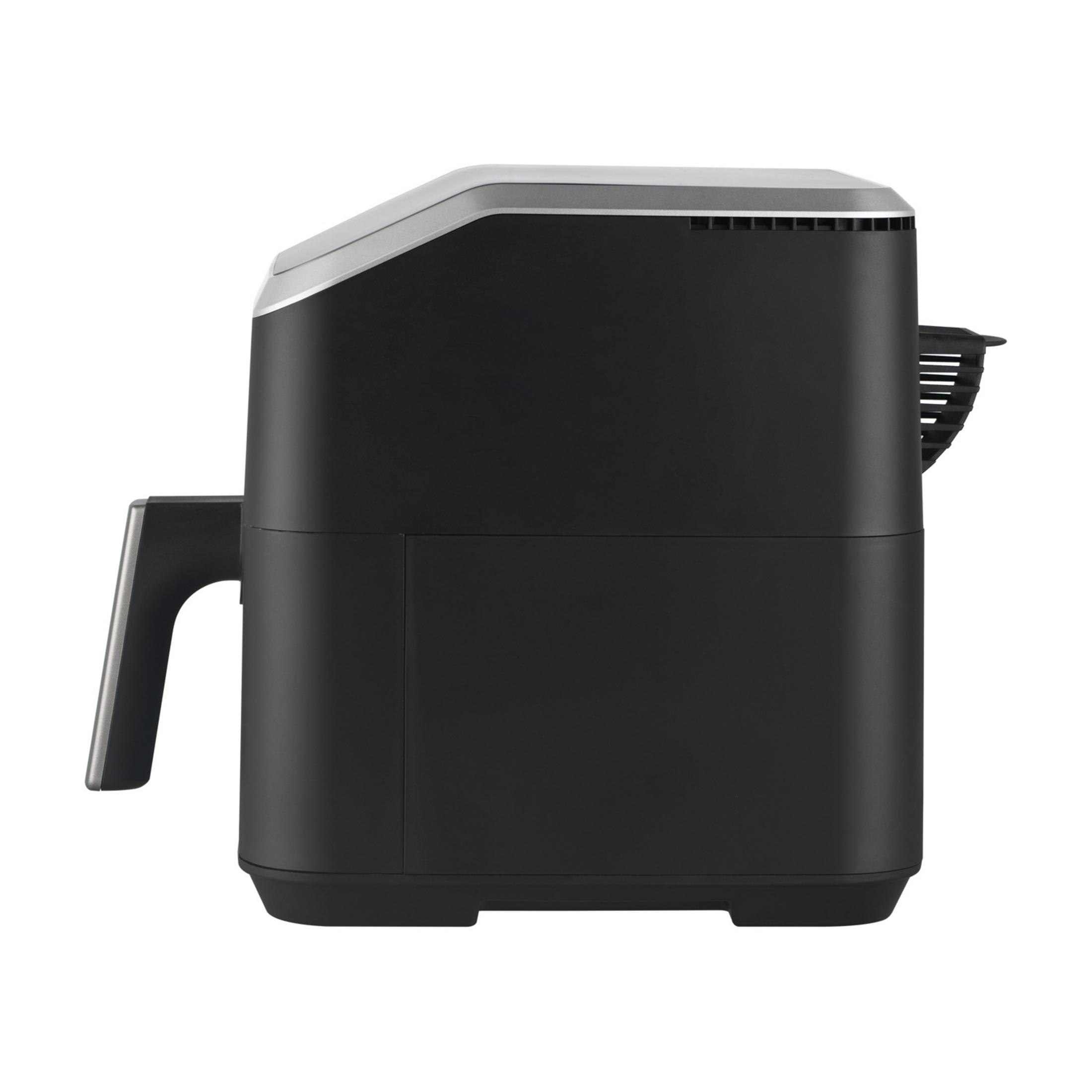 Czarna frytkownica beztłuszczowa ze srebrną rączką i srebrną górą.