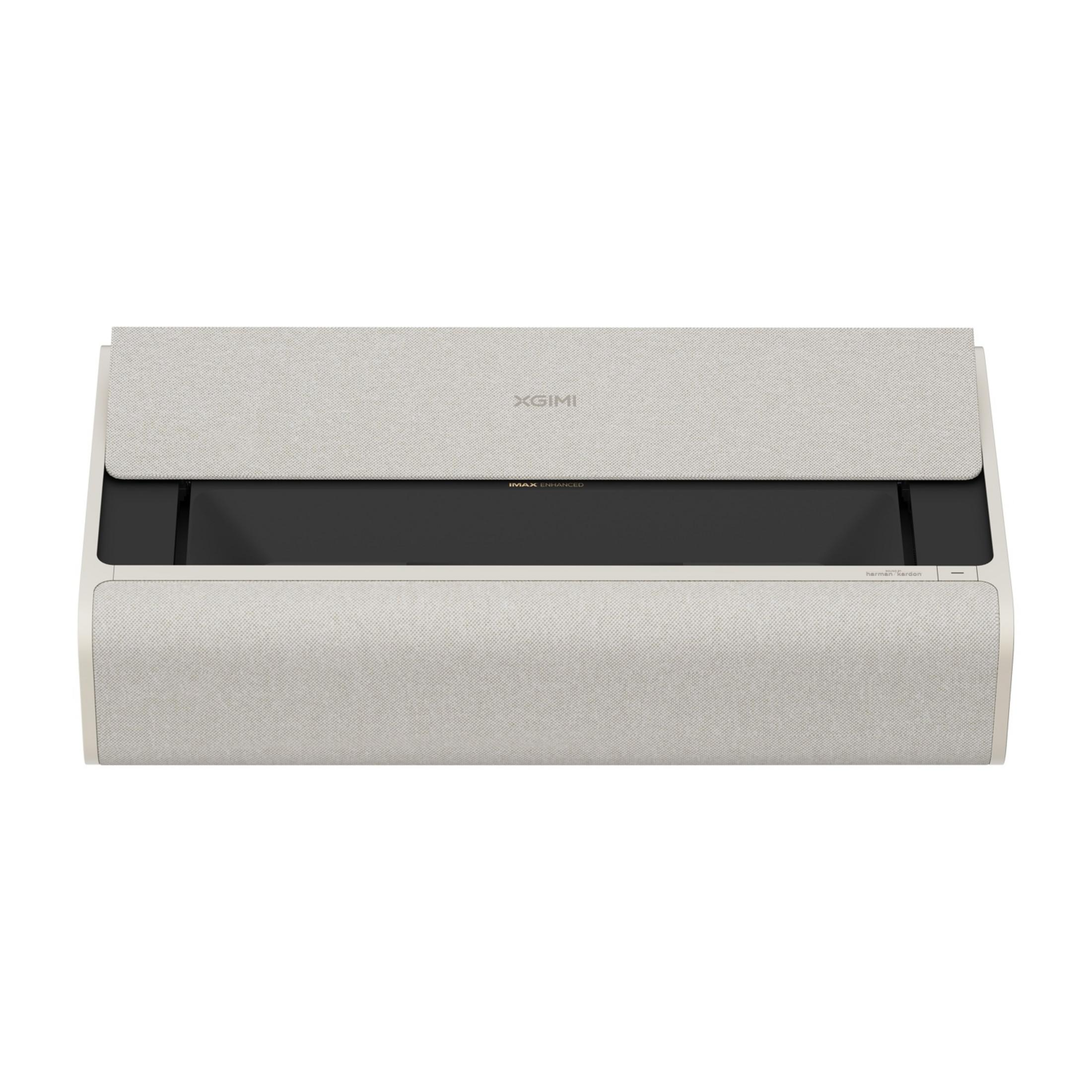 Een lichtgekleurde, rechthoekige projector met grijze stoffen afdekkingen en een zwarte voorkant.