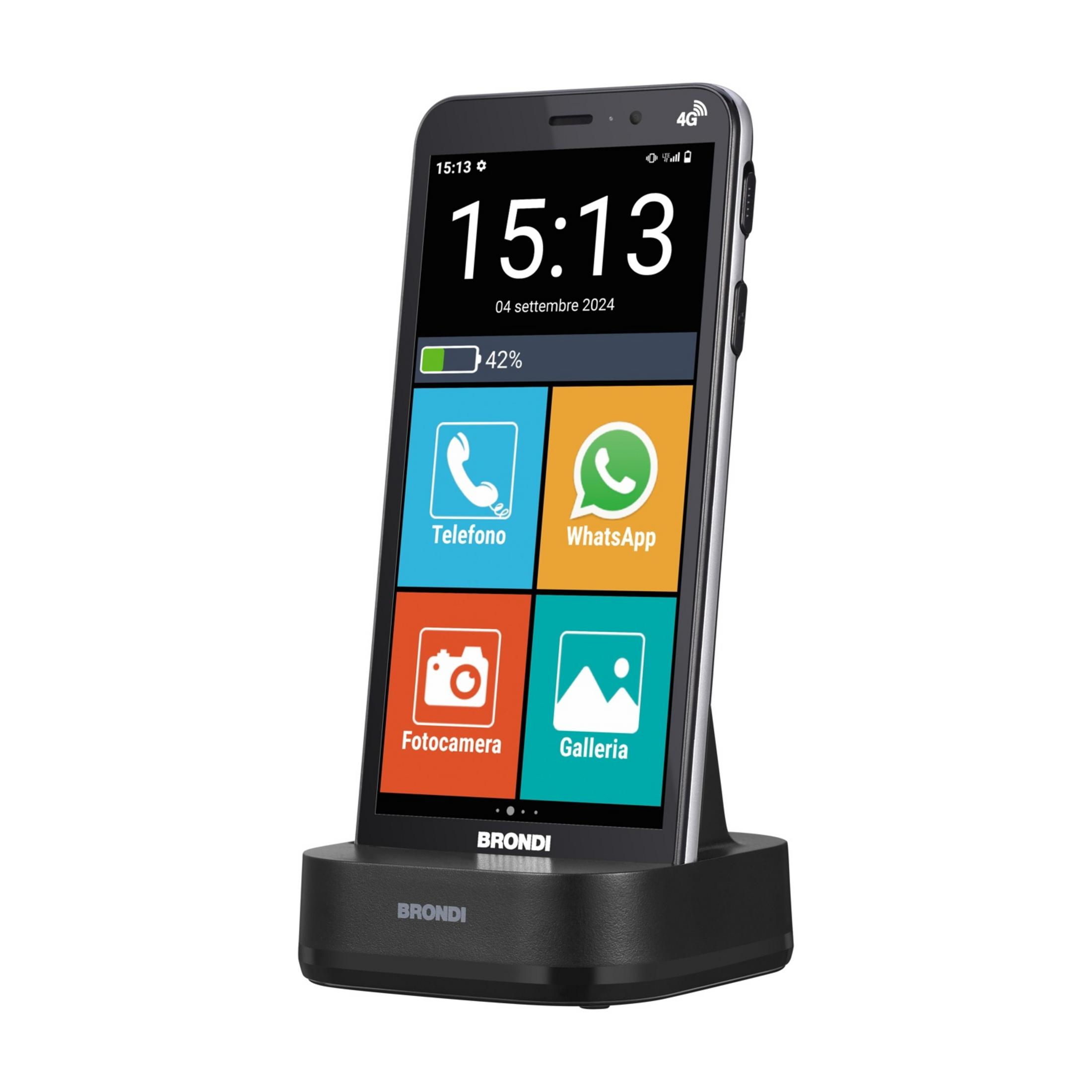 Uno smartphone Brondi in una base di ricarica, mostra ora e app.