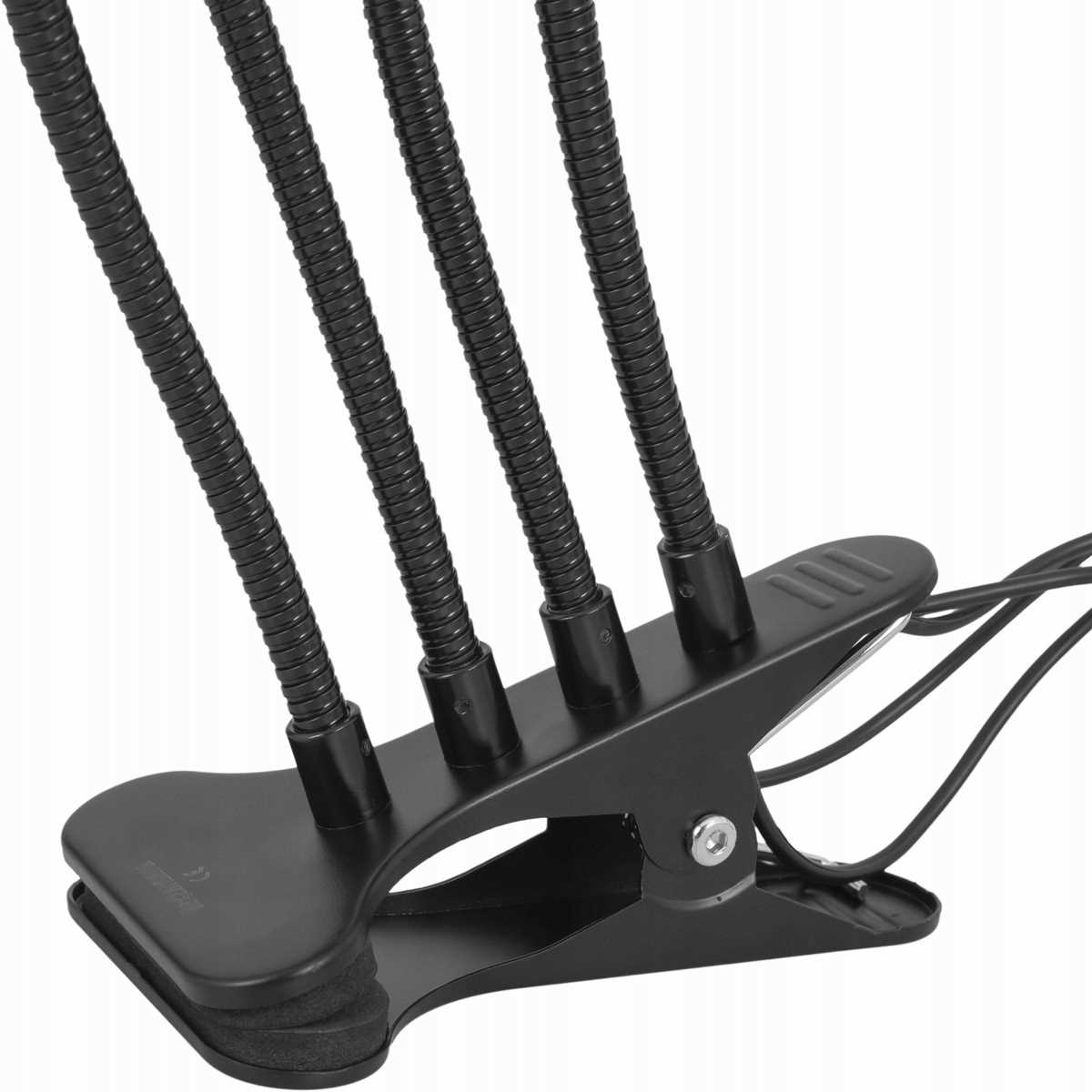 Czarny uchwyt klipsowy z czterema elastycznymi ramionami, na białym tle.